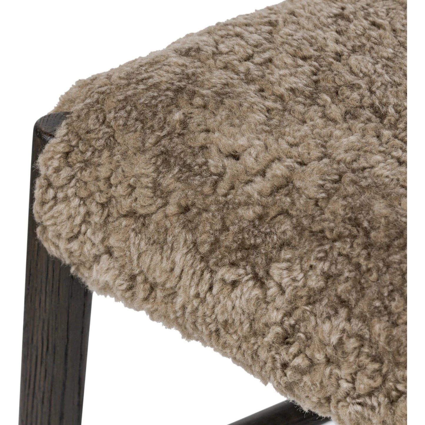 010 SI-2519180 | Closeup | Glenmore Dining Chair by Four Hands in taupe shearling, light carbon. Made from shearling, solid oak in a eclectic & global style.