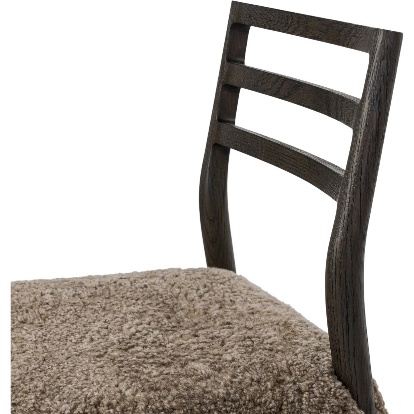 011 SI-2519180 | Closeup | Glenmore Dining Chair by Four Hands in taupe shearling, light carbon. Made from shearling, solid oak in a eclectic & global style.