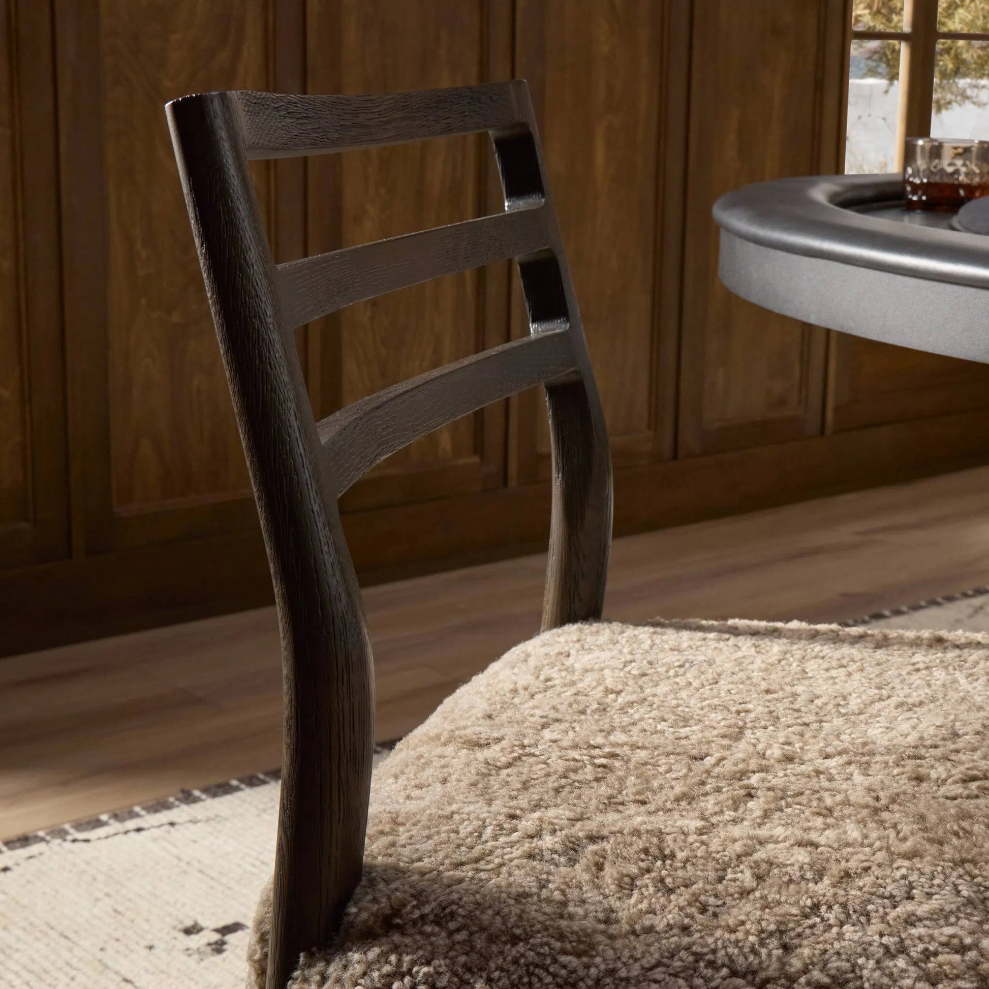 Glenmore Dining Chair by Four Hands in taupe shearling, light carbon. Made from shearling, solid oak in a eclectic & global style.