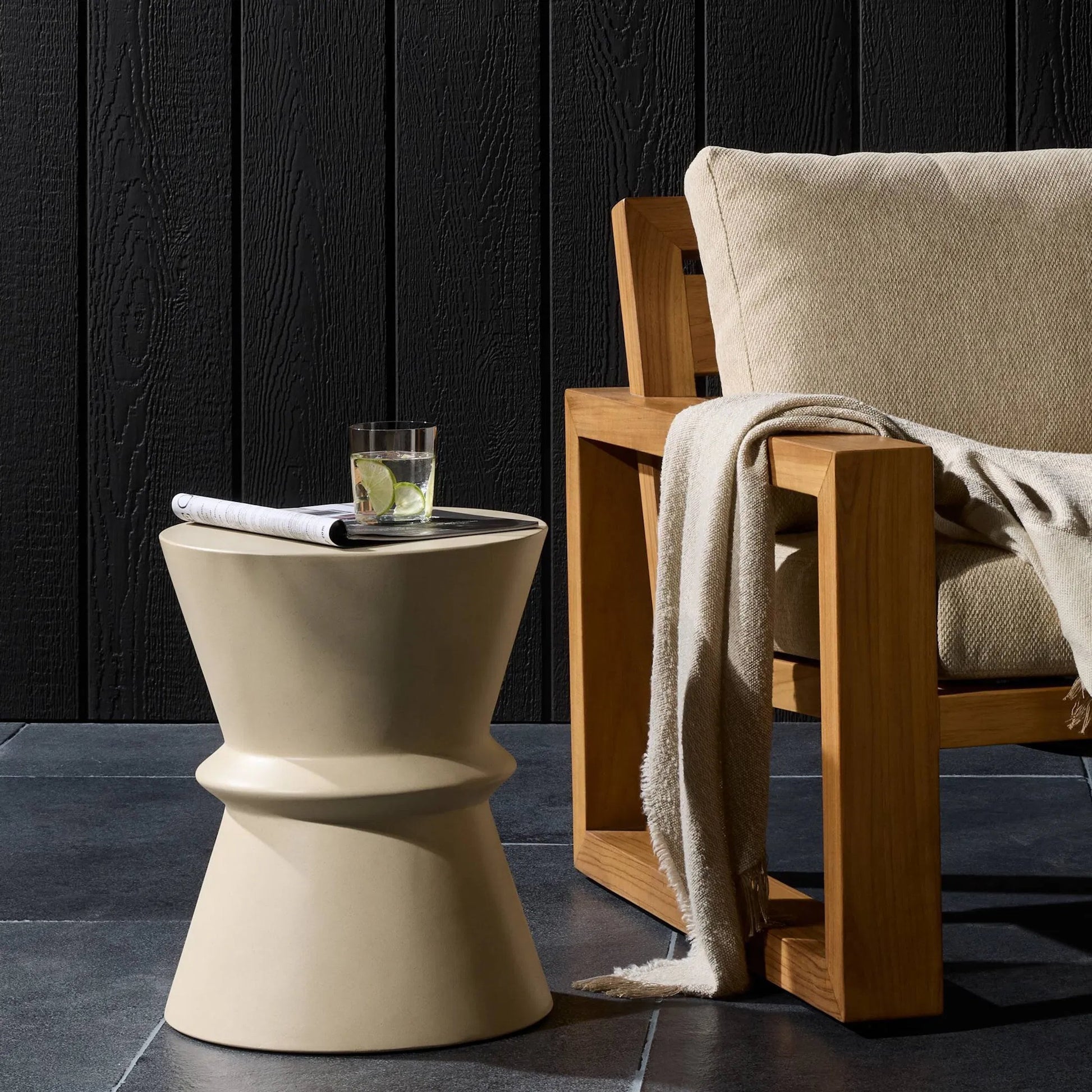 Lina End Table by Four Hands. Made from concrete in a modern style.