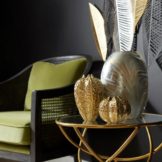 Pores Vase by Cyan Design in gold. Made from porcelain in a eclectic & global style.