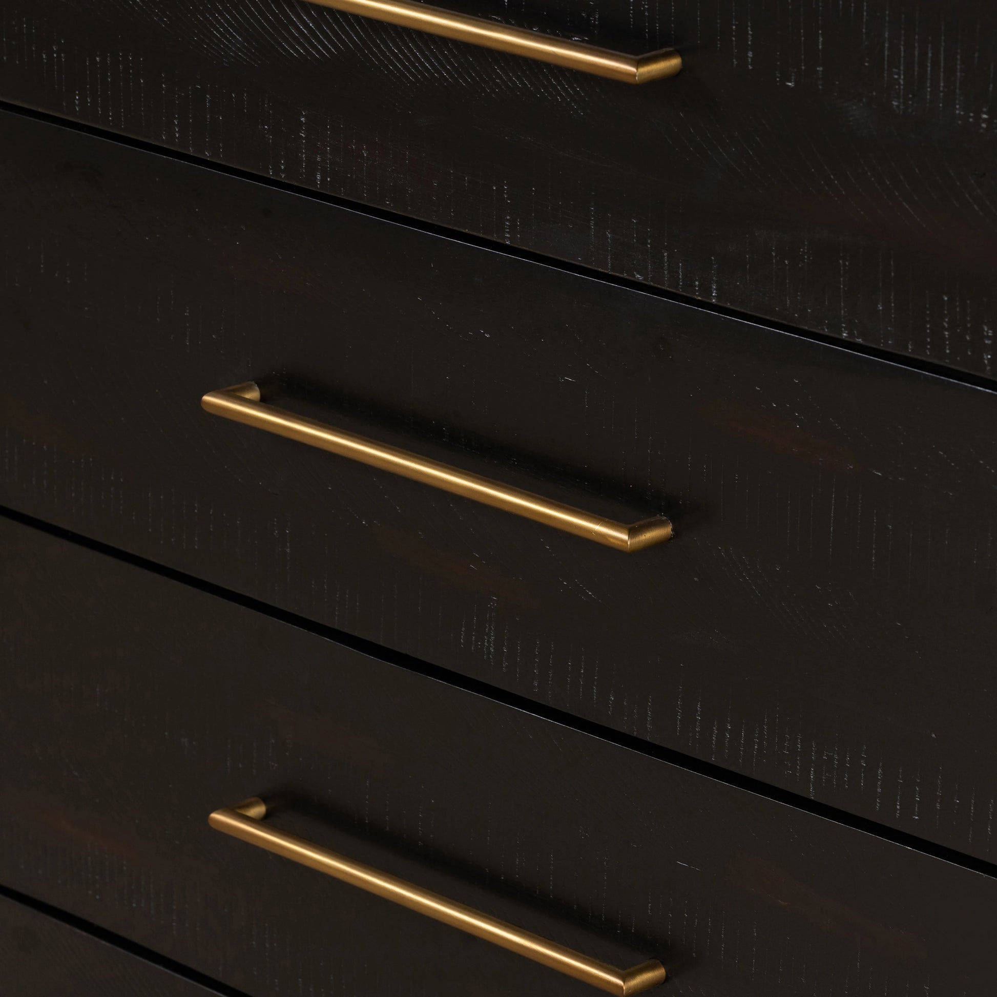 Suki Tall Boy by Four Hands in burnished black. Made from resawn mixed wood, mixed wood solid in a modern style.