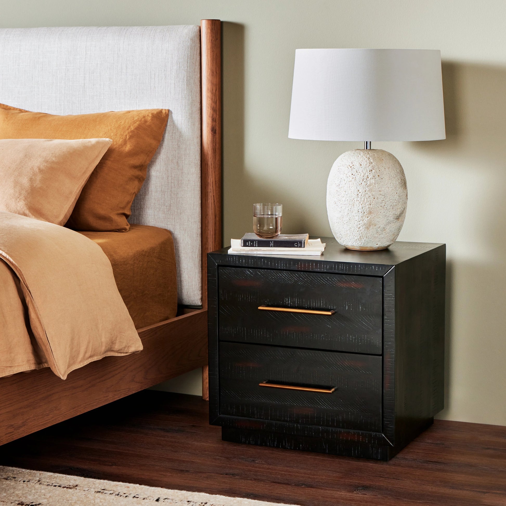 Suki Nightstand by Four Hands in burnished black, brass (alexa hardware) and burnished black. Made from resawn mixed wood in a modern style.