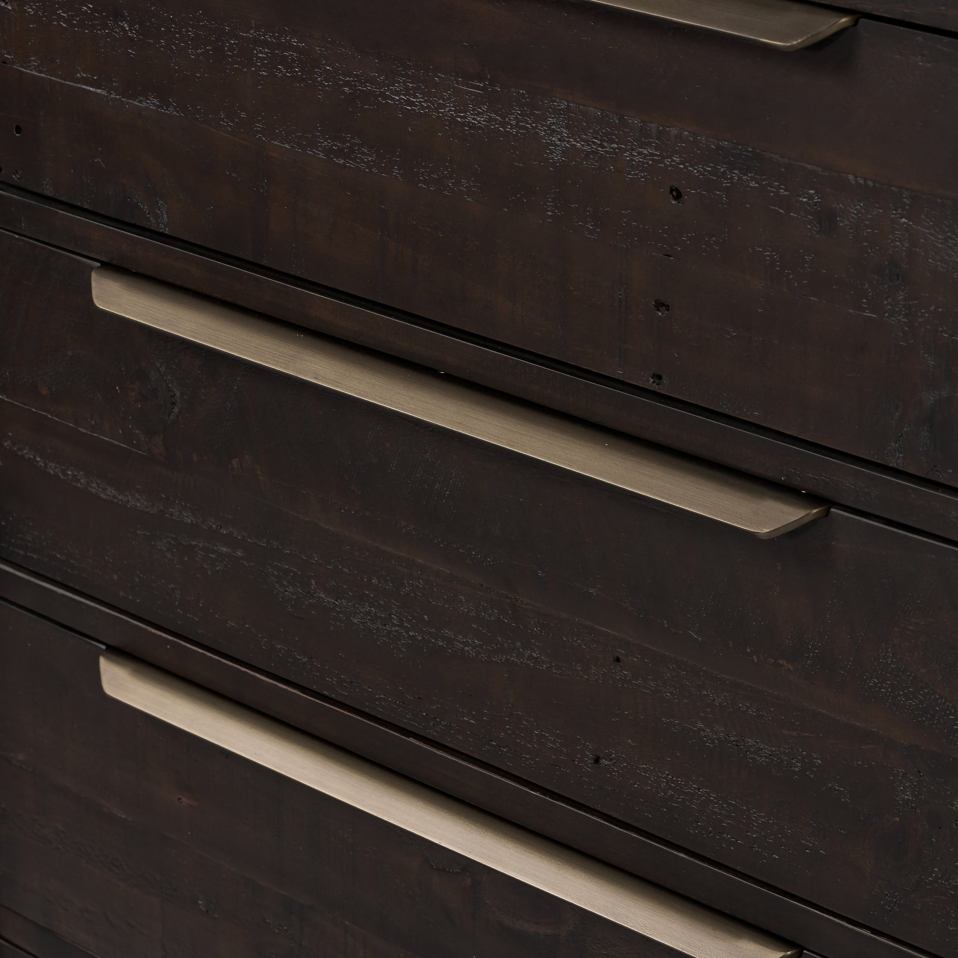 Wyeth 5 Drawer Dresser by Four Hands in dark carbon, antique brass and dark carbon. Made from solid reclaimed pine, iron in a rustic style.