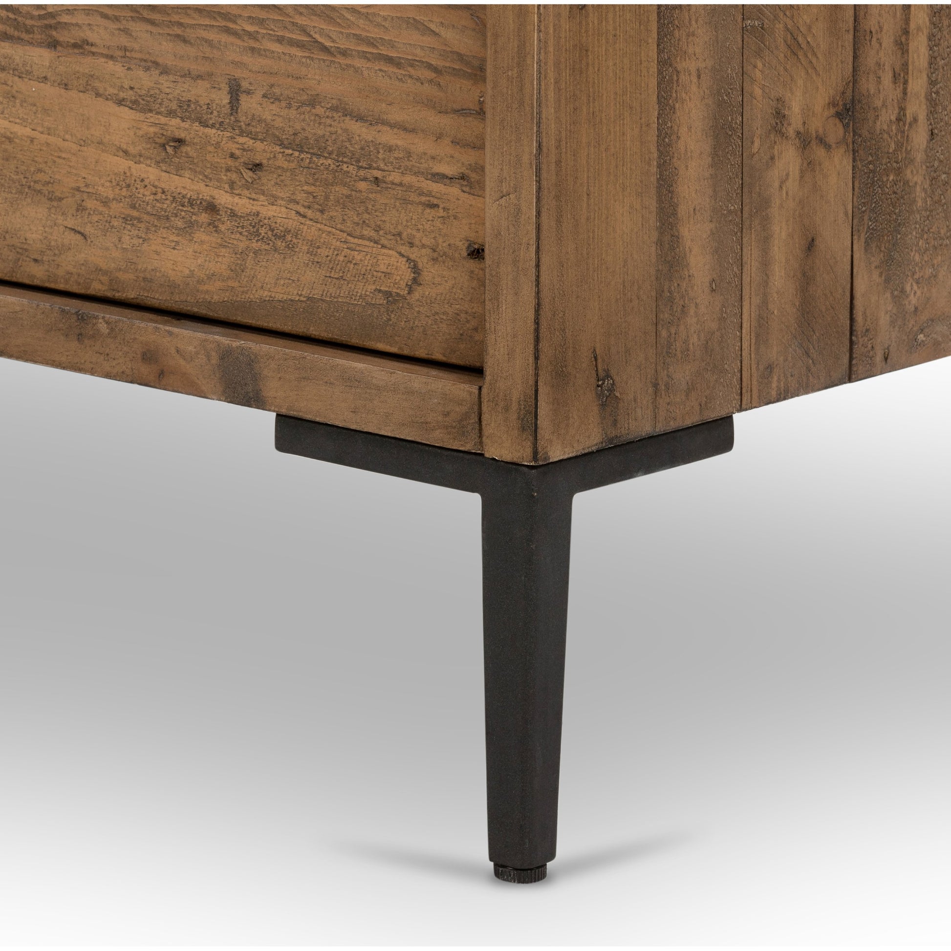 Wyeth 5 Drawer Dresser by Four Hands in dark carbon, antique brass and dark carbon. Made from solid reclaimed pine, iron in a rustic style.