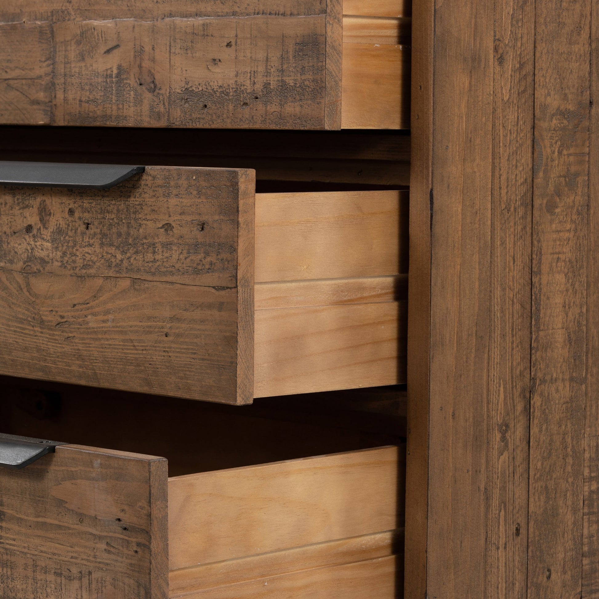Wyeth 6 Drawer Dresser by Four Hands in dark carbon, antique brass and dark carbon. Made from solid reclaimed pine, iron in a rustic style.