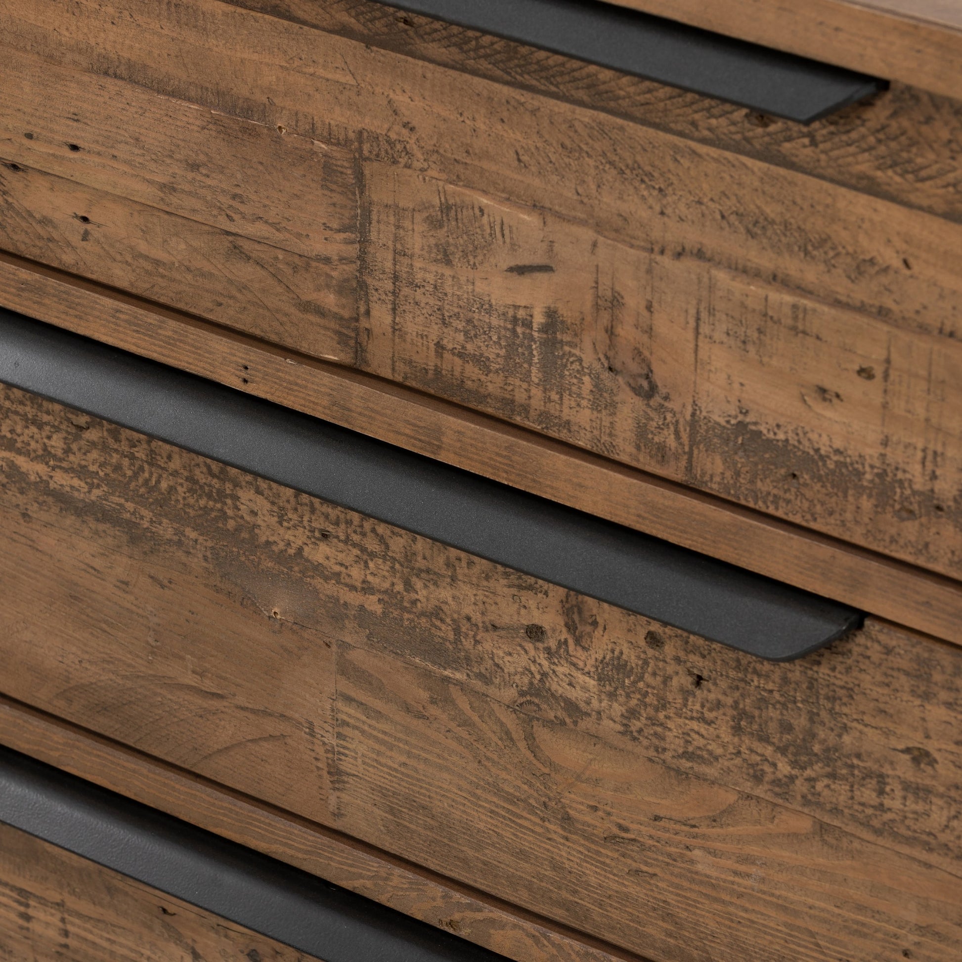 Wyeth 6 Drawer Dresser by Four Hands in dark carbon, antique brass and dark carbon. Made from solid reclaimed pine, iron in a rustic style.