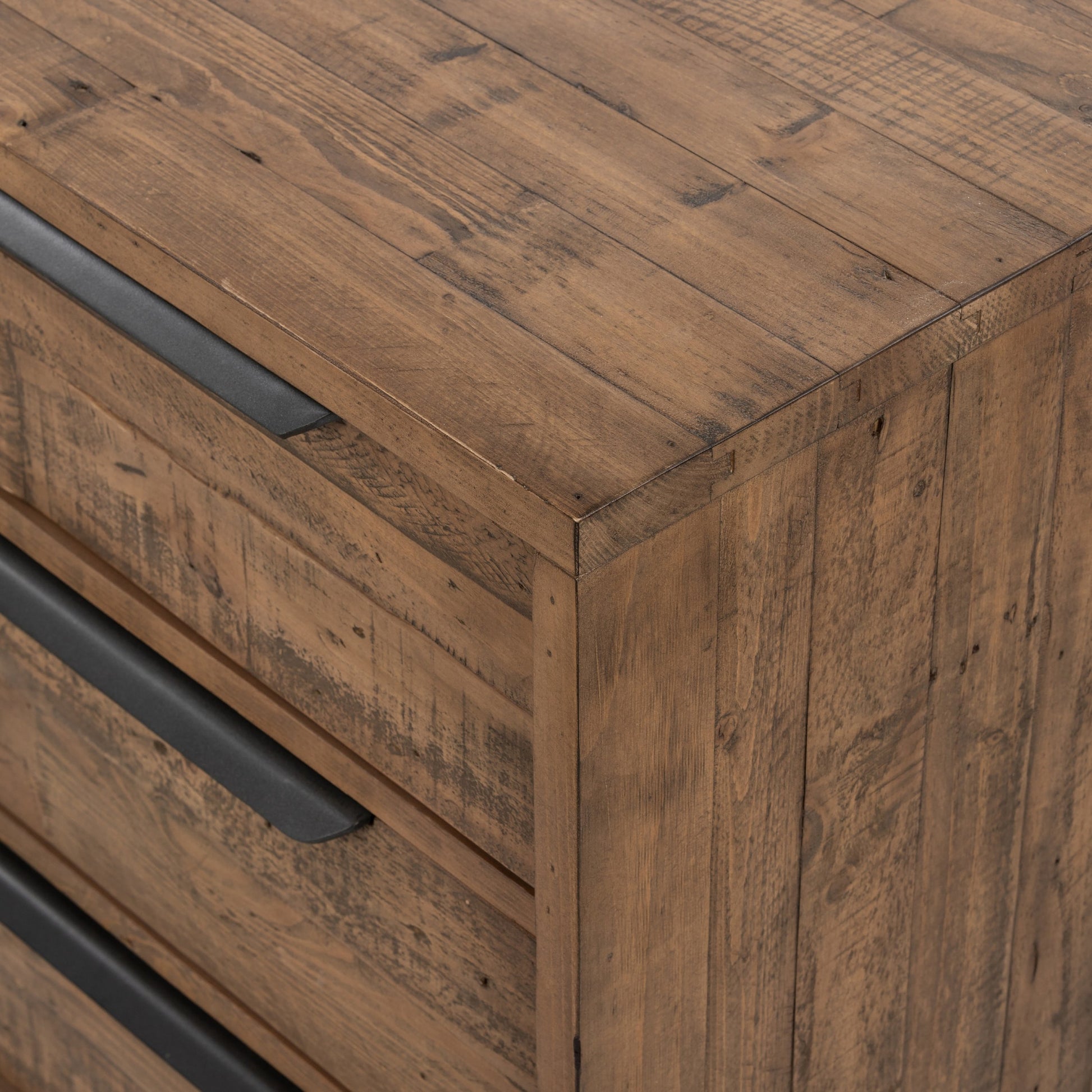Wyeth 6 Drawer Dresser by Four Hands in dark carbon, antique brass and dark carbon. Made from solid reclaimed pine, iron in a rustic style.