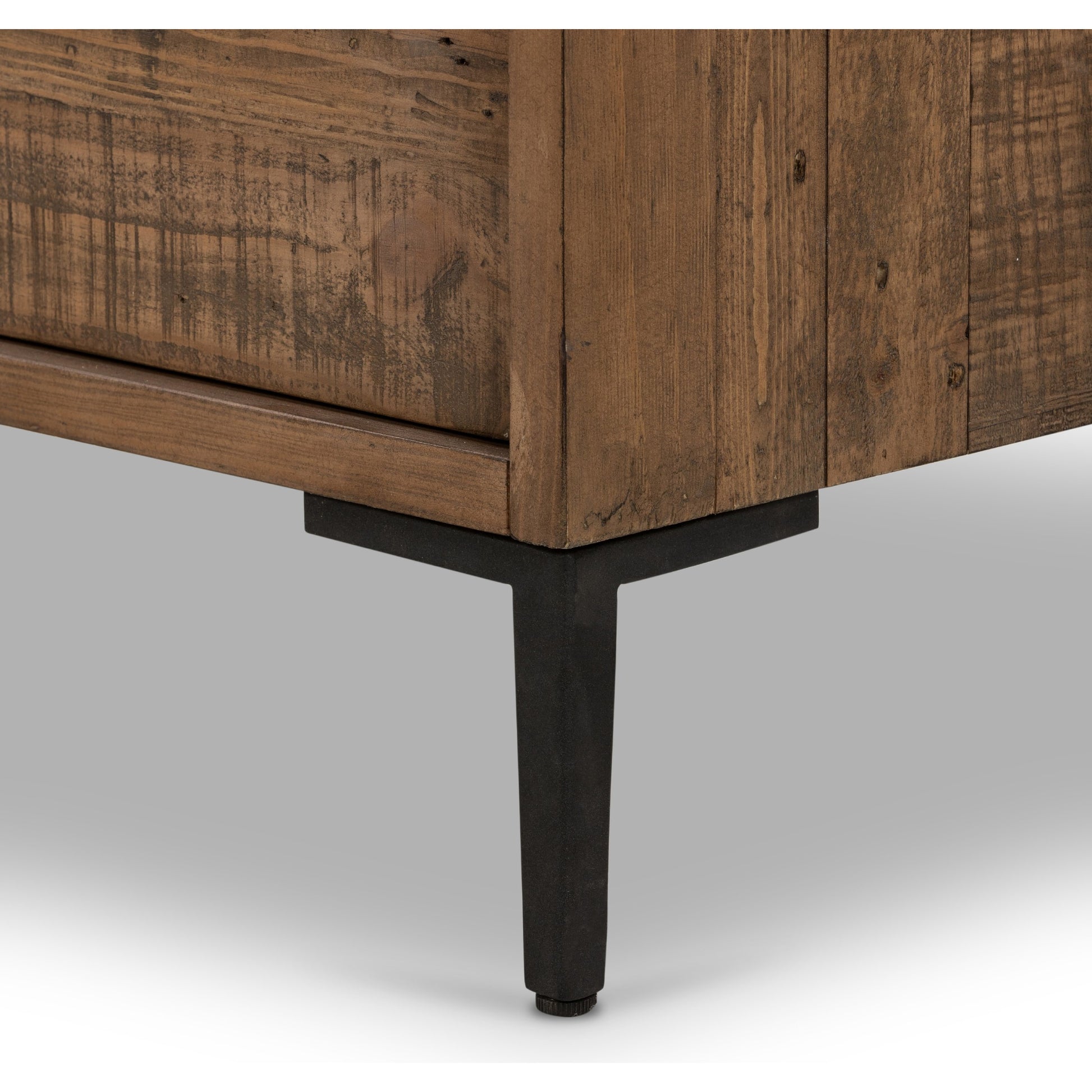 Wyeth 6 Drawer Dresser by Four Hands in dark carbon, antique brass and dark carbon. Made from solid reclaimed pine, iron in a rustic style.