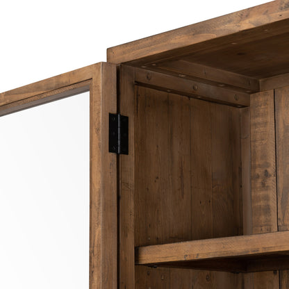 Wyeth Cabinet by Four Hands in dark carbon, tempered glass, antique brass and dark carbon. Made from solid reclaimed pine, iron in a modern style.