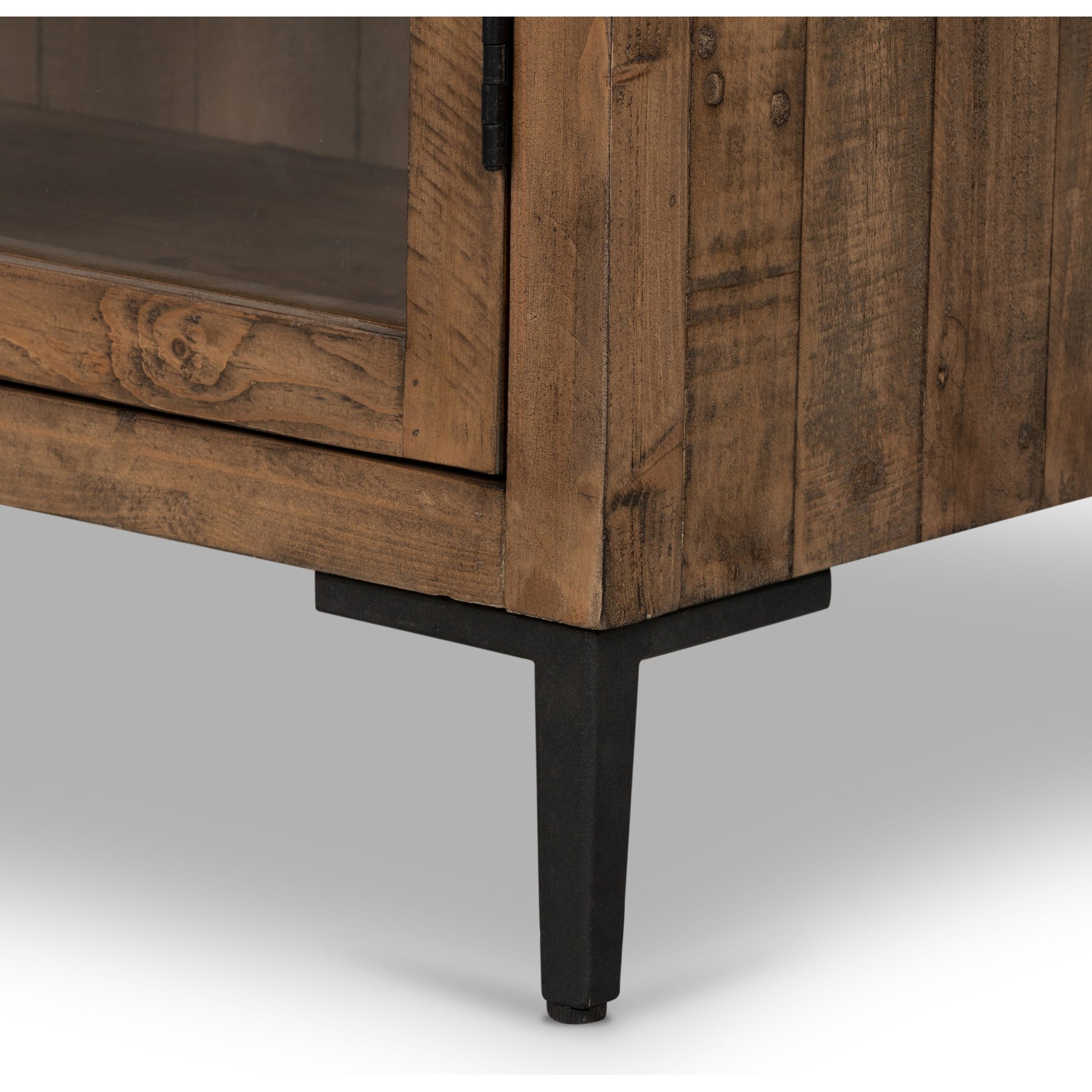 Wyeth Cabinet by Four Hands in dark carbon, tempered glass, antique brass and dark carbon. Made from solid reclaimed pine, iron in a modern style.