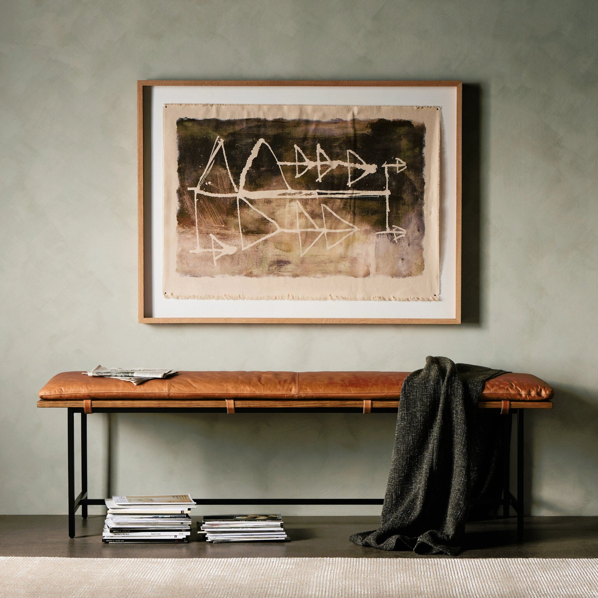 Gabine Accent Bench by Four Hands in brandy and midnight iron, toasted nettlewood. Made from top grain leather, iron, solid nettlewood in a modern style.