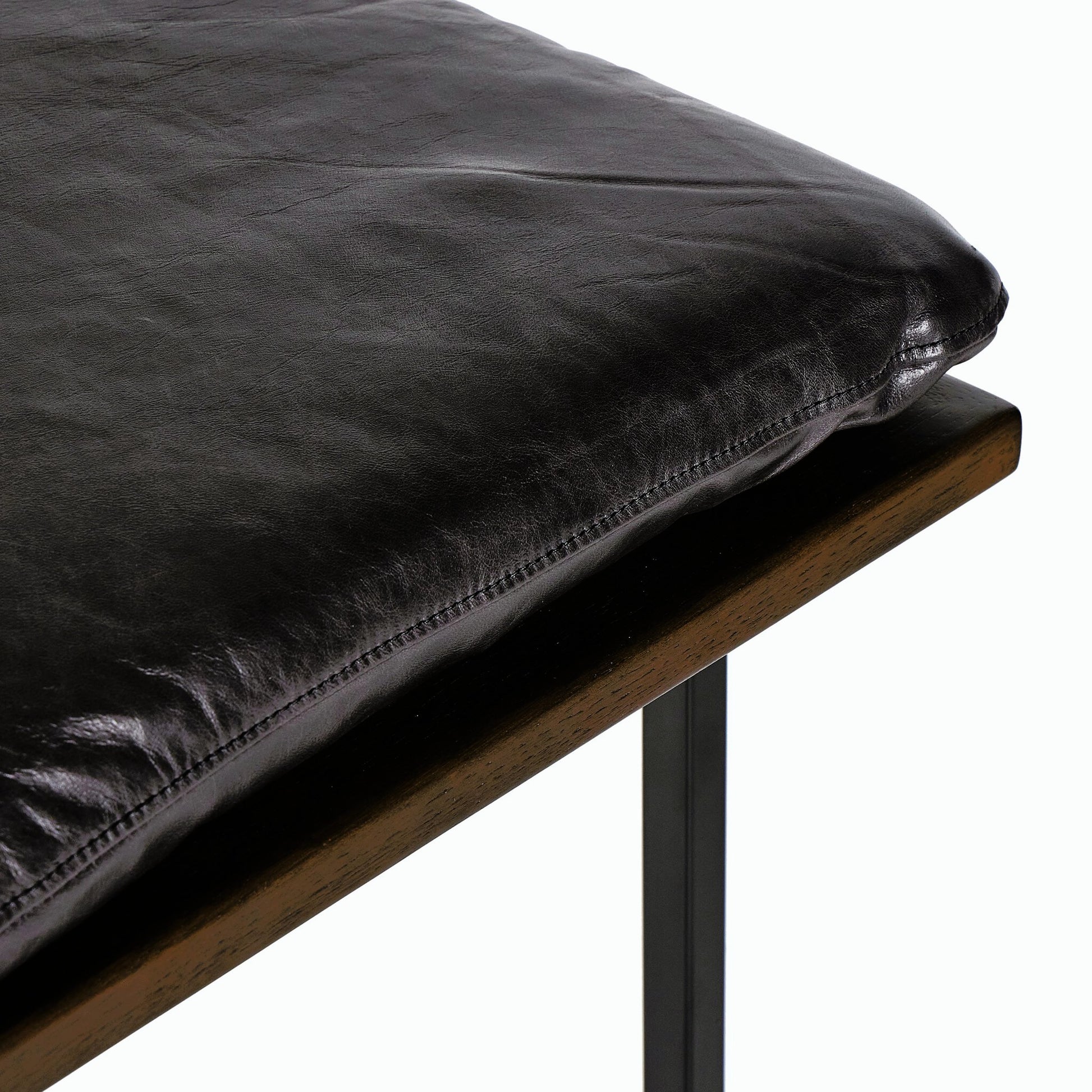 Gabine Accent Bench by Four Hands in brandy and midnight iron, toasted nettlewood. Made from top grain leather, iron, solid nettlewood in a modern style.