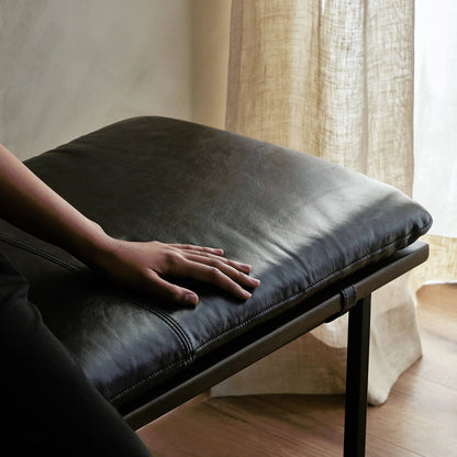 Gabine Accent Bench by Four Hands in brandy and midnight iron, toasted nettlewood. Made from top grain leather, iron, solid nettlewood in a modern style.