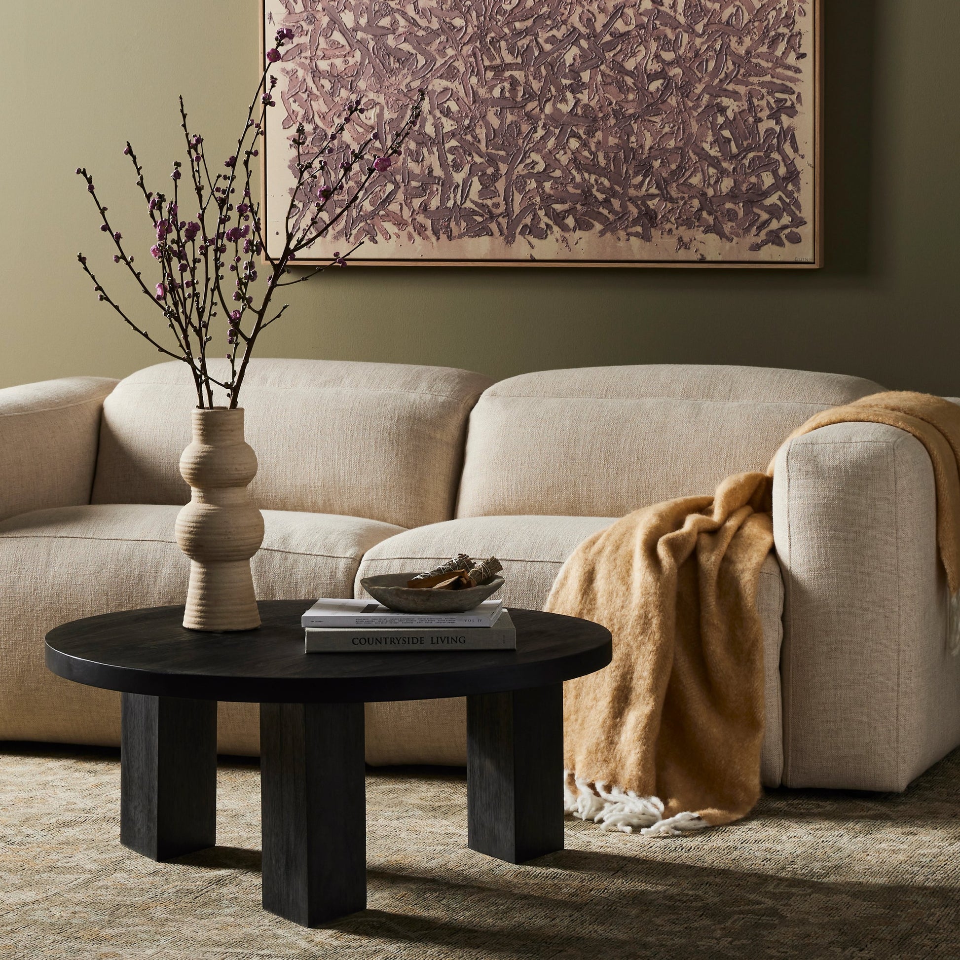 Mesa Round Coffee Table by Four Hands in light brushed parawood. Made from solid parawood in a eclectic & global style.