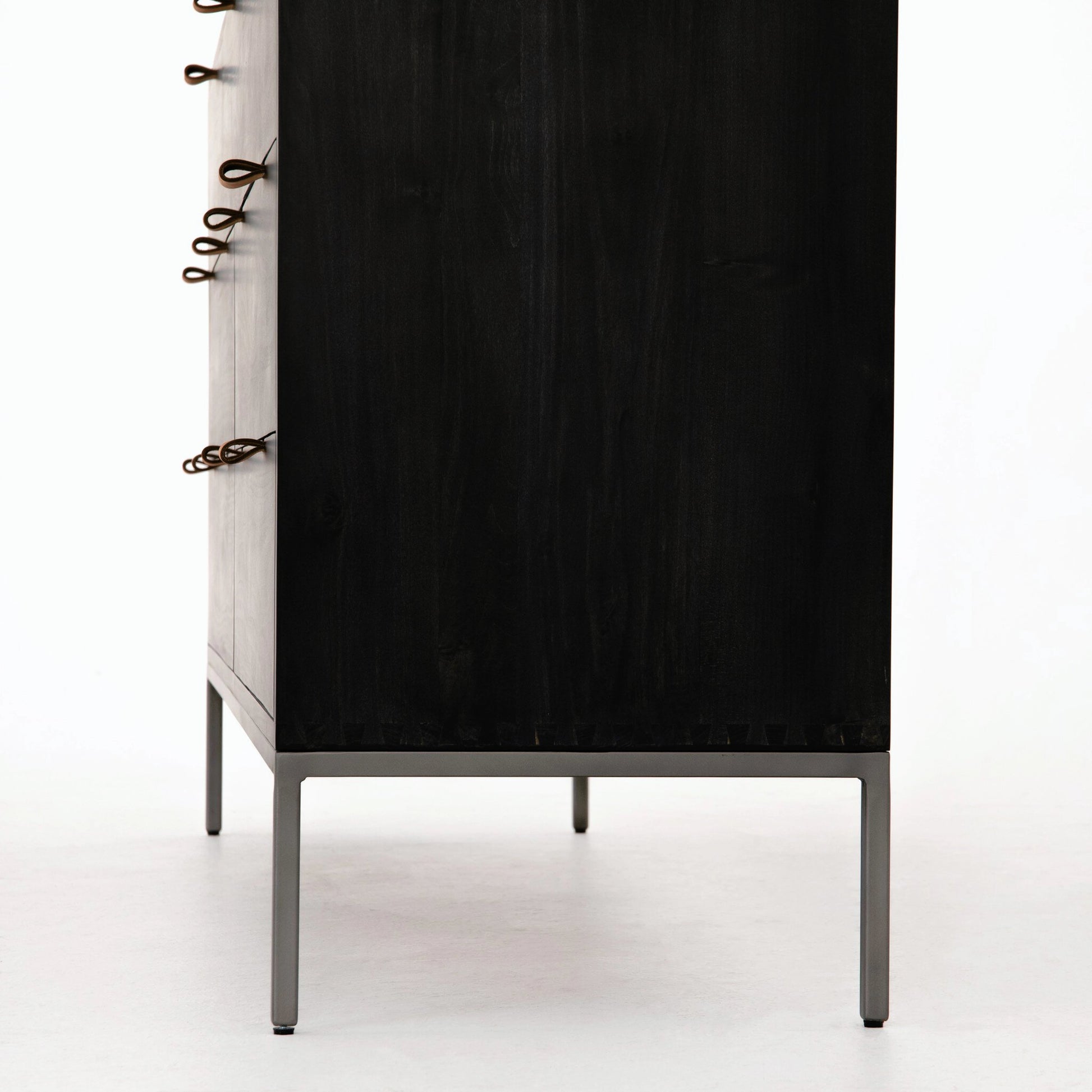 Trey 7 Drawer Dresser by Four Hands. Made from solid poplar, top grain leather in a rustic style.