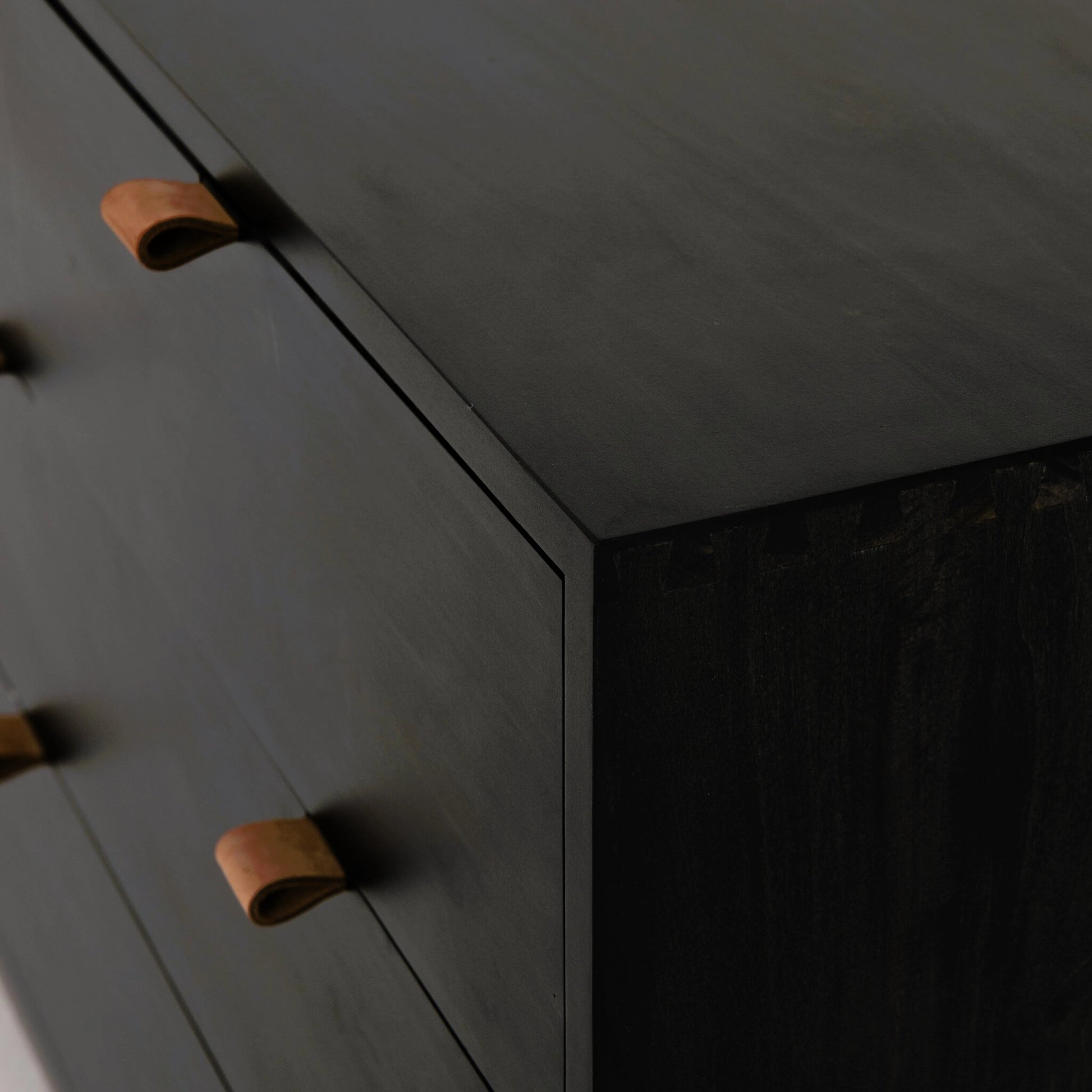 Trey 7 Drawer Dresser by Four Hands. Made from solid poplar, top grain leather in a rustic style.