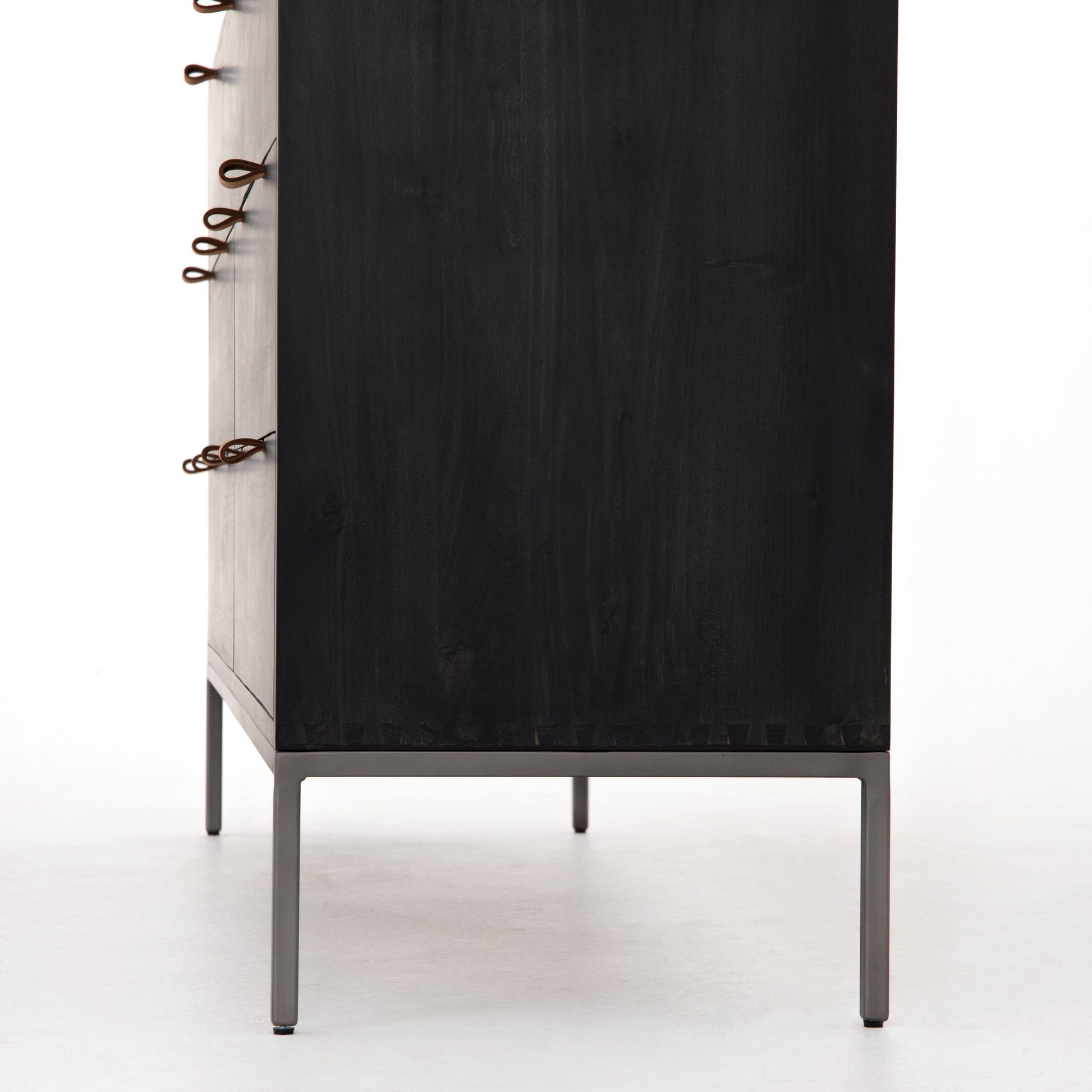 Trey 7 Drawer Dresser by Four Hands. Made from solid poplar, top grain leather in a rustic style.