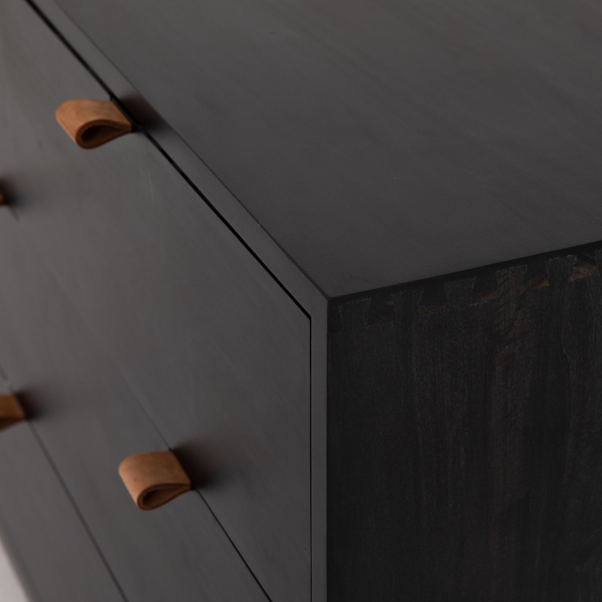 Trey 7 Drawer Dresser by Four Hands. Made from solid poplar, top grain leather in a rustic style.