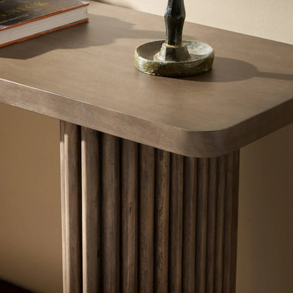 Rutherford Console Table by Four Hands in reclaimed ashen brown. Made from solid mixed reclaimed wood in a eclectic & global style.