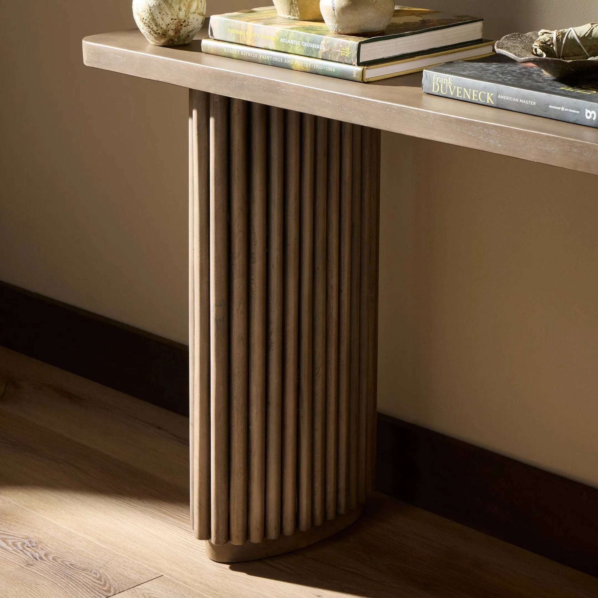 Rutherford Console Table by Four Hands in reclaimed ashen brown. Made from solid mixed reclaimed wood in a eclectic & global style.
