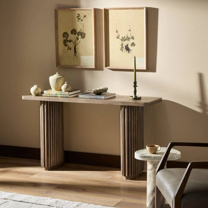 Rutherford Console Table by Four Hands in reclaimed ashen brown. Made from solid mixed reclaimed wood in a eclectic & global style.