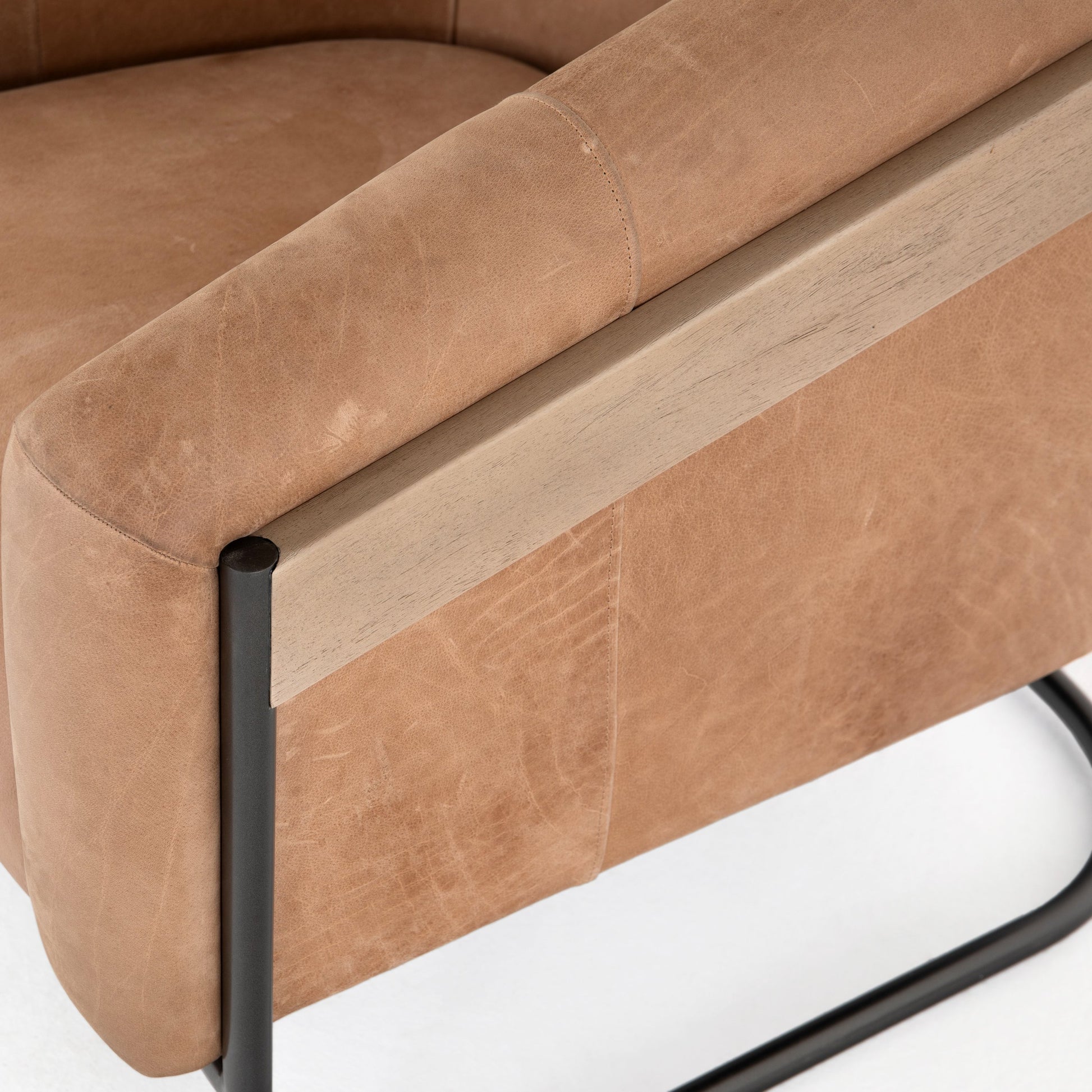 Etta Chair by Four Hands. Made from top grain leather, iron, solid parawood in a modern style.
