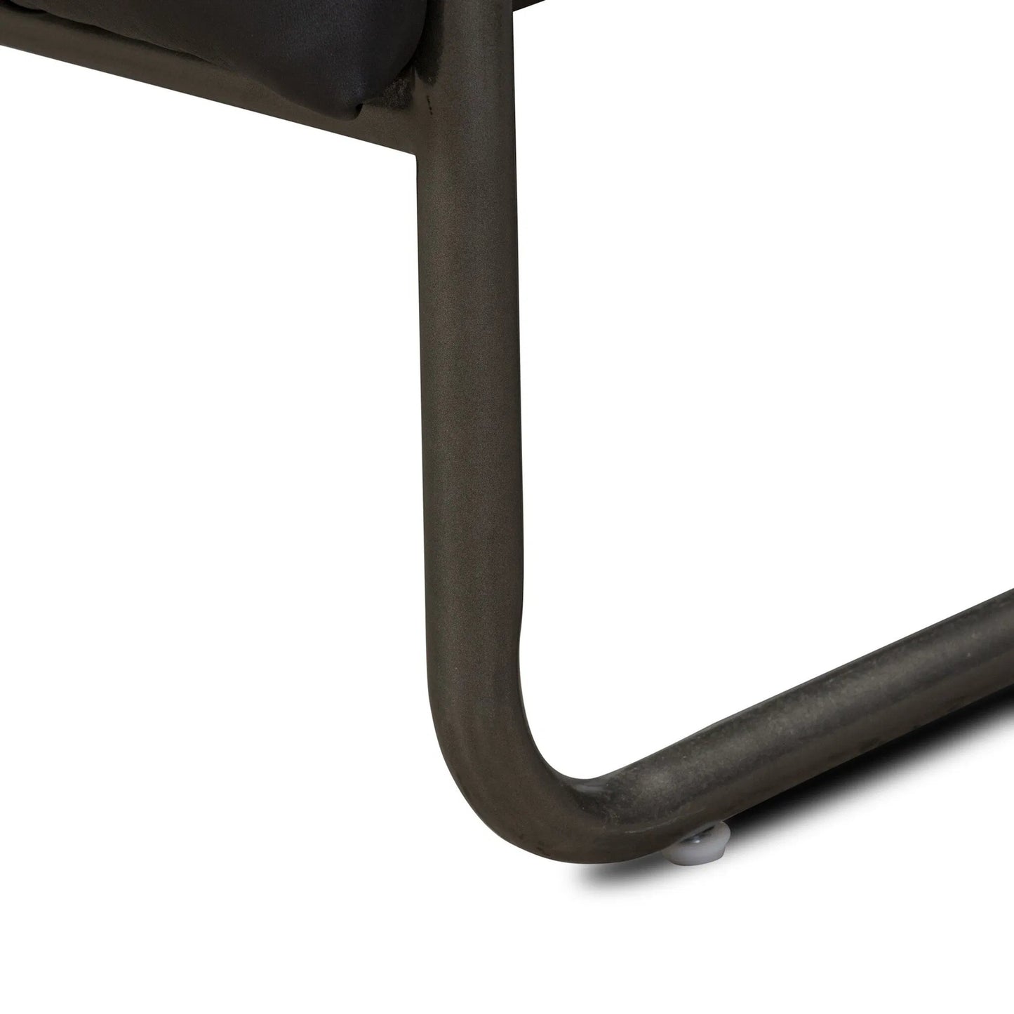 073 SI-1977308 | Closeup | Etta Chair by Four Hands. Made from top grain leather, iron, solid parawood in a modern style.