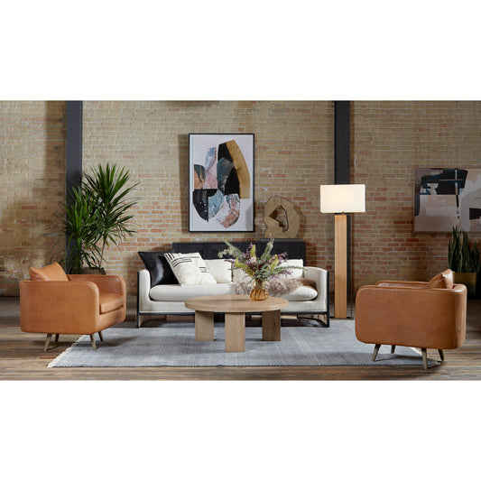 Kaya Swivel Chair by Four Hands in haven tobacco. Made from top grain leather, solid parawood, 100% polyester in a modern style.