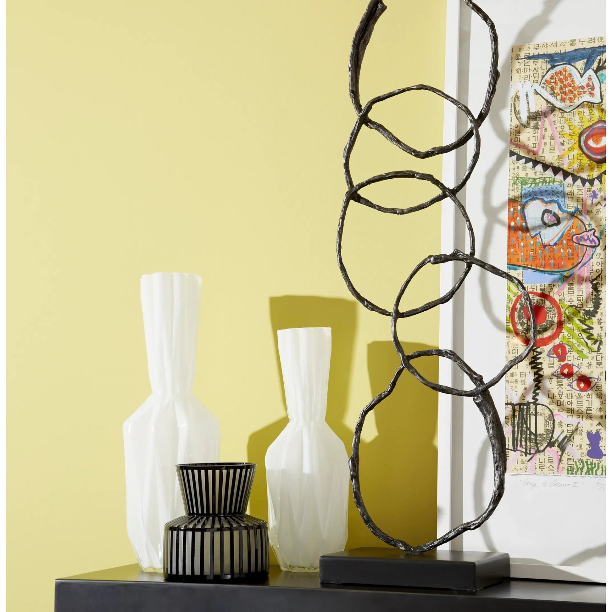 Lined Up Vase by Cyan Design in black. Made from glass in a modern style.