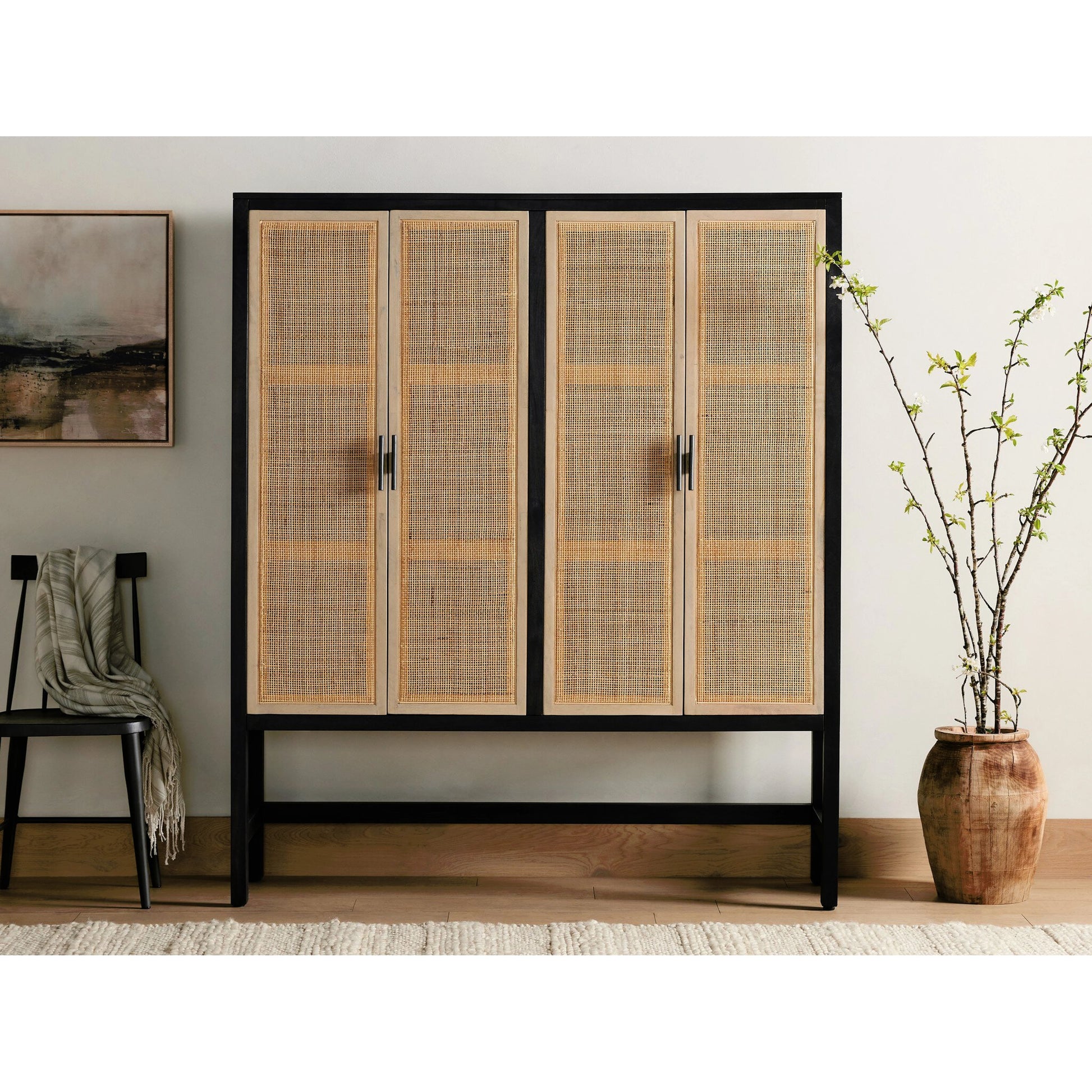 Caprice Cabinet by Four Hands in black wash mango, black natural cane. Made from cane, solid mango in a eclectic & global style.