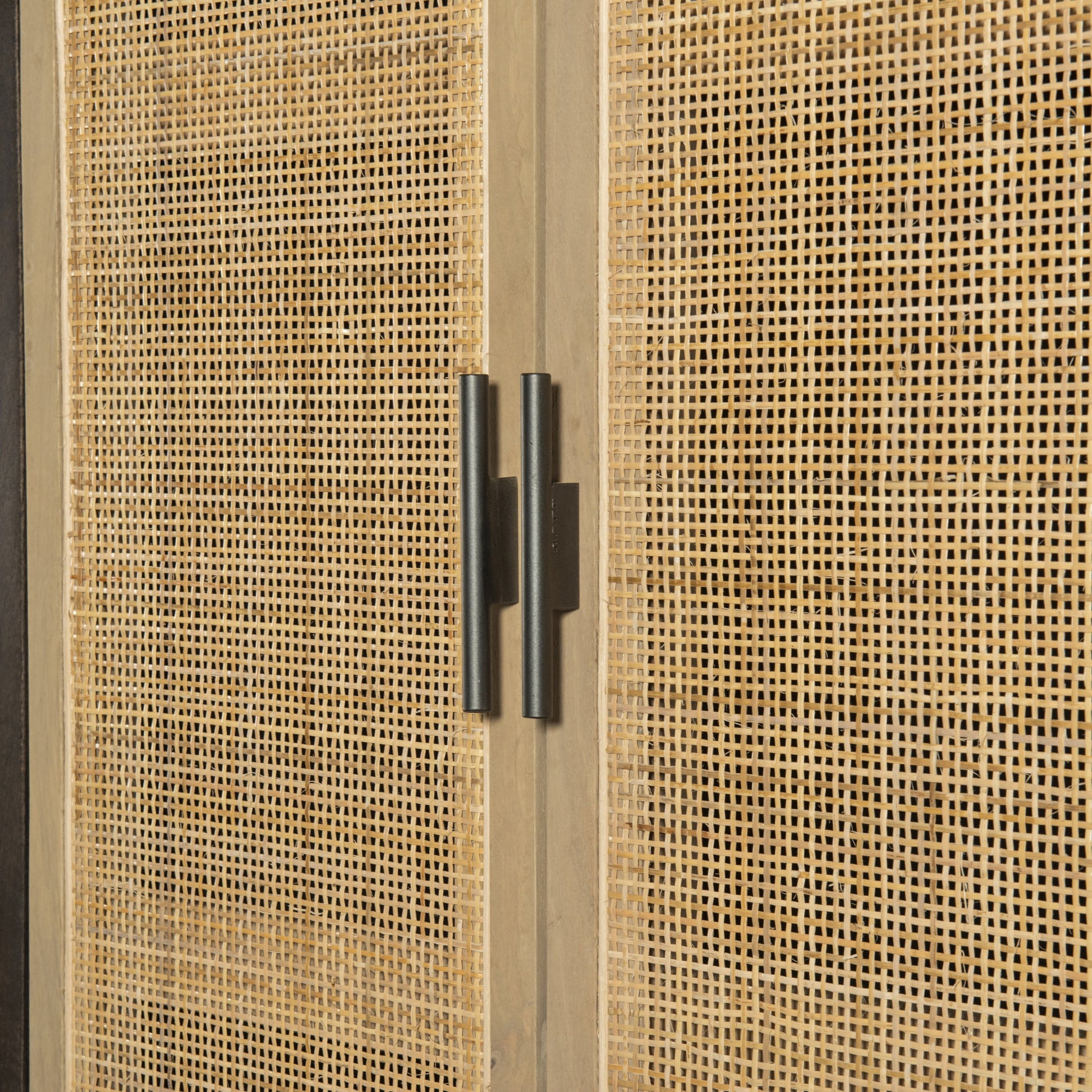 Caprice Cabinet by Four Hands in black wash mango, black natural cane. Made from cane, solid mango in a eclectic & global style.