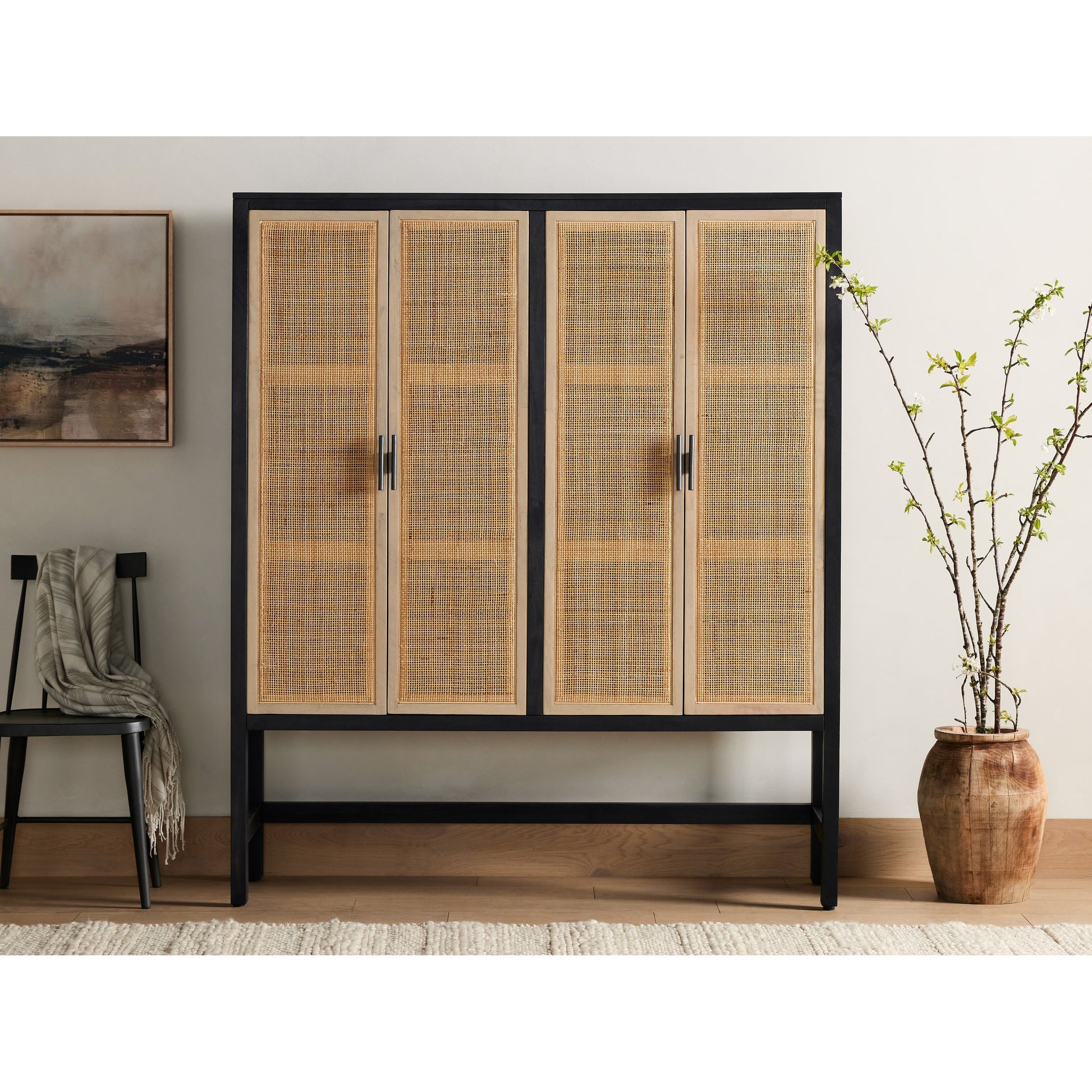 Caprice Cabinet by Four Hands in black wash mango, black natural cane. Made from cane, solid mango in a eclectic & global style.