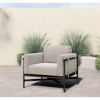 Hearst Outdoor Chair by Four Hands in bronze. Made from 100% olefin, aluminum, 100% polypropylene in a modern style.