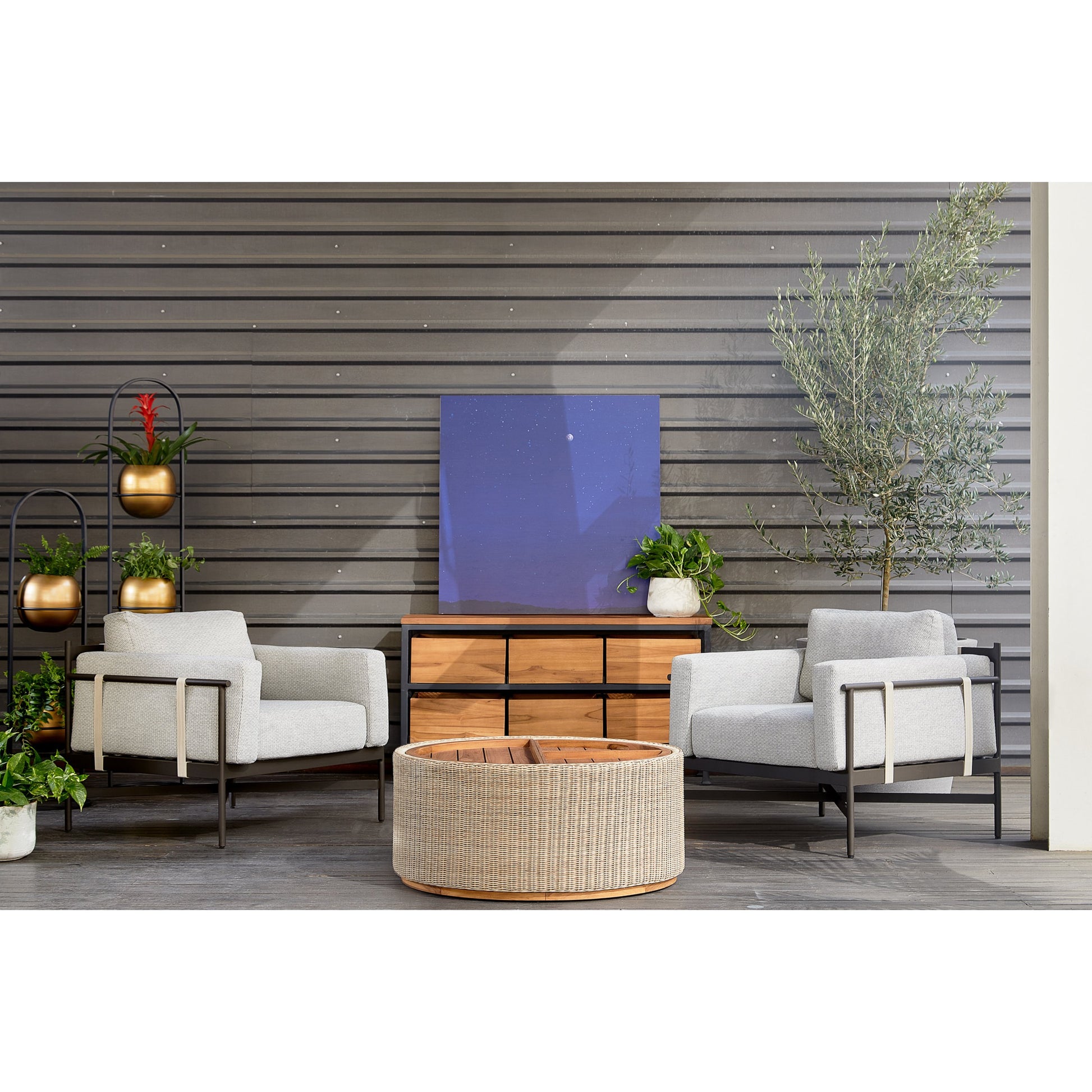 Hearst Outdoor Chair by Four Hands in bronze. Made from 100% olefin, aluminum, 100% polypropylene in a modern style.