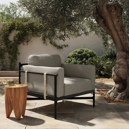 Hearst Outdoor Chair by Four Hands in bronze. Made from 100% olefin, aluminum, 100% polypropylene in a modern style.