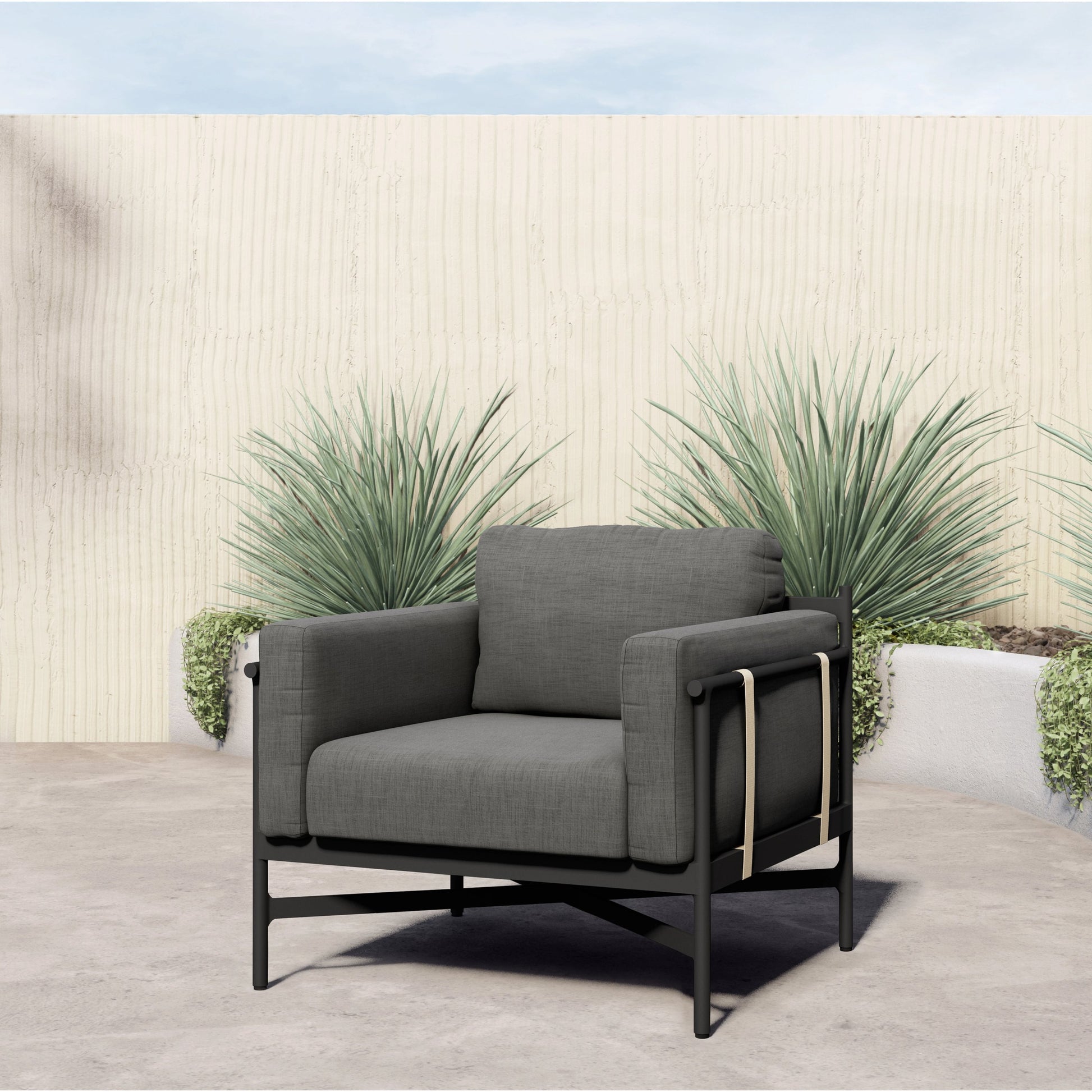 Hearst Outdoor Chair by Four Hands in bronze. Made from 100% olefin, aluminum, 100% polypropylene in a modern style.