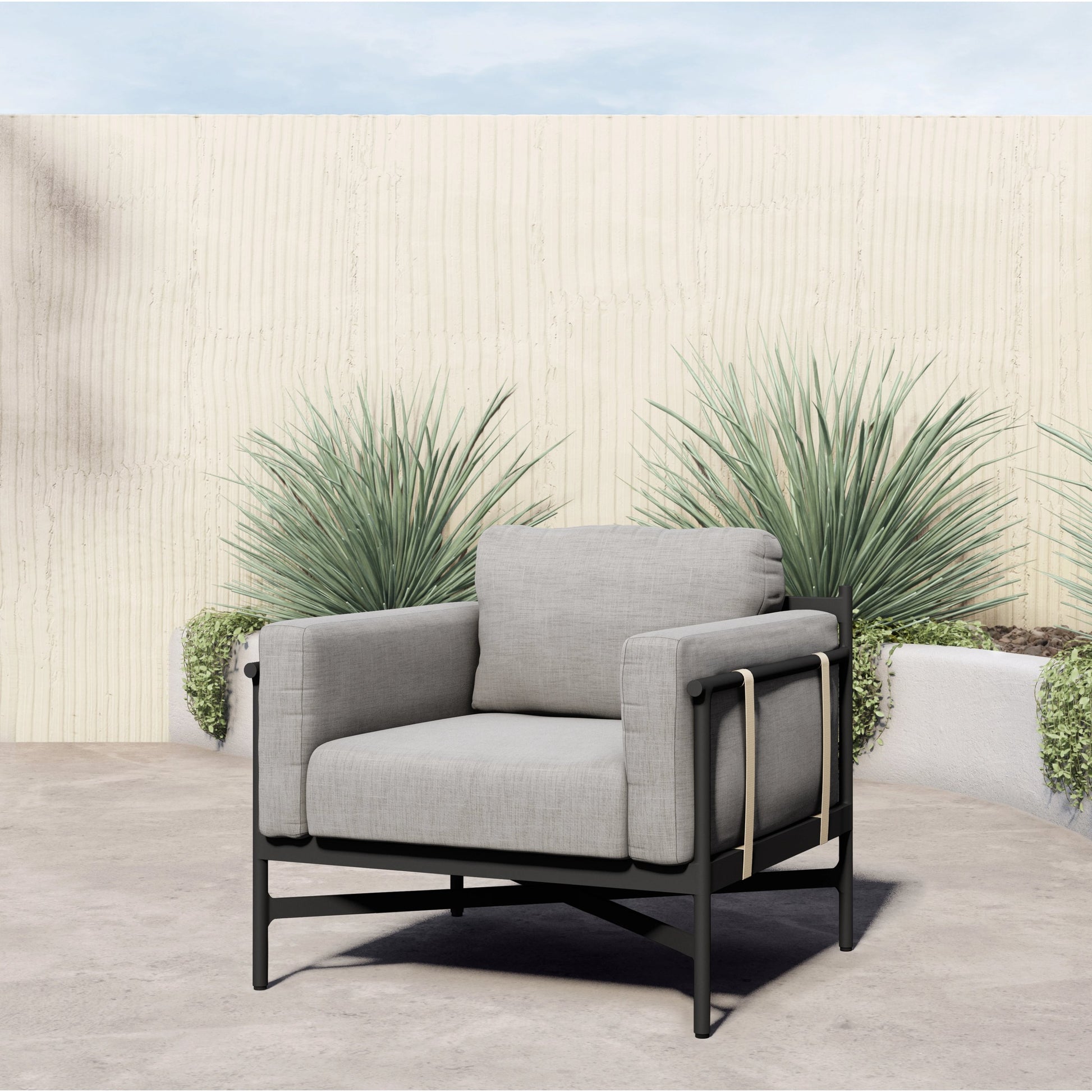 Hearst Outdoor Chair by Four Hands in bronze. Made from 100% olefin, aluminum, 100% polypropylene in a modern style.