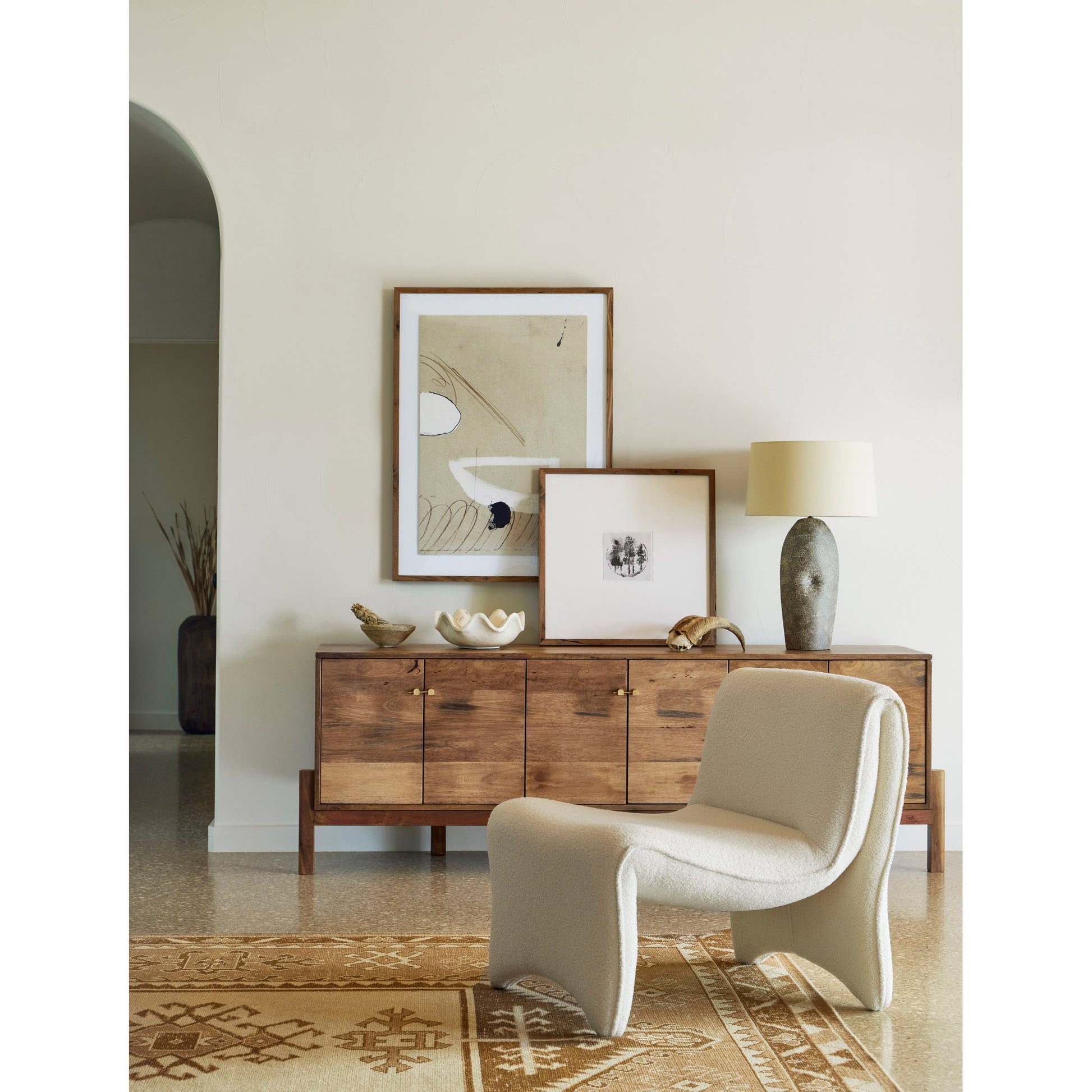 Reza Media Console by Four Hands in worn black. Made from solid parawood, solid acacia, iron in a eclectic & global style.