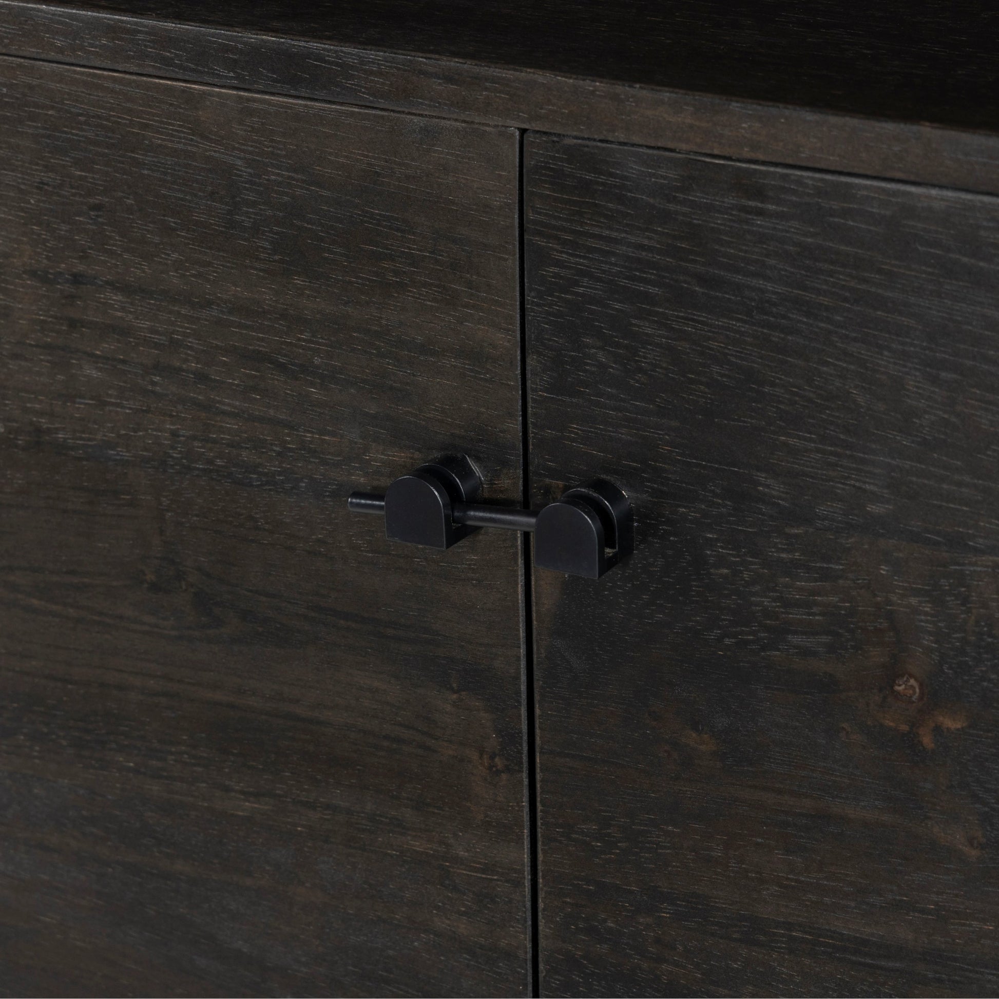 Reza Media Console by Four Hands in worn black. Made from solid parawood, solid acacia, iron in a eclectic & global style.