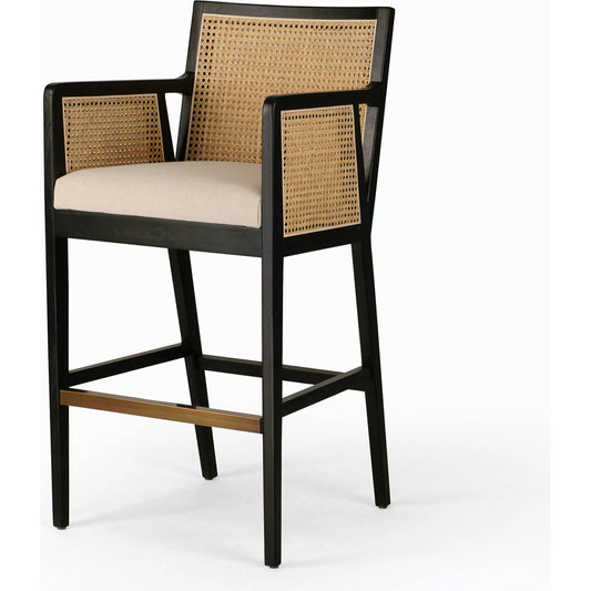 Antonia Bar Stool by Four Hands in light natural cane, brushed ebony, brass kickplate, savile flax. Made from 92% polyester, 8% flax, linen, solid nettlewood, iron in a modern style.