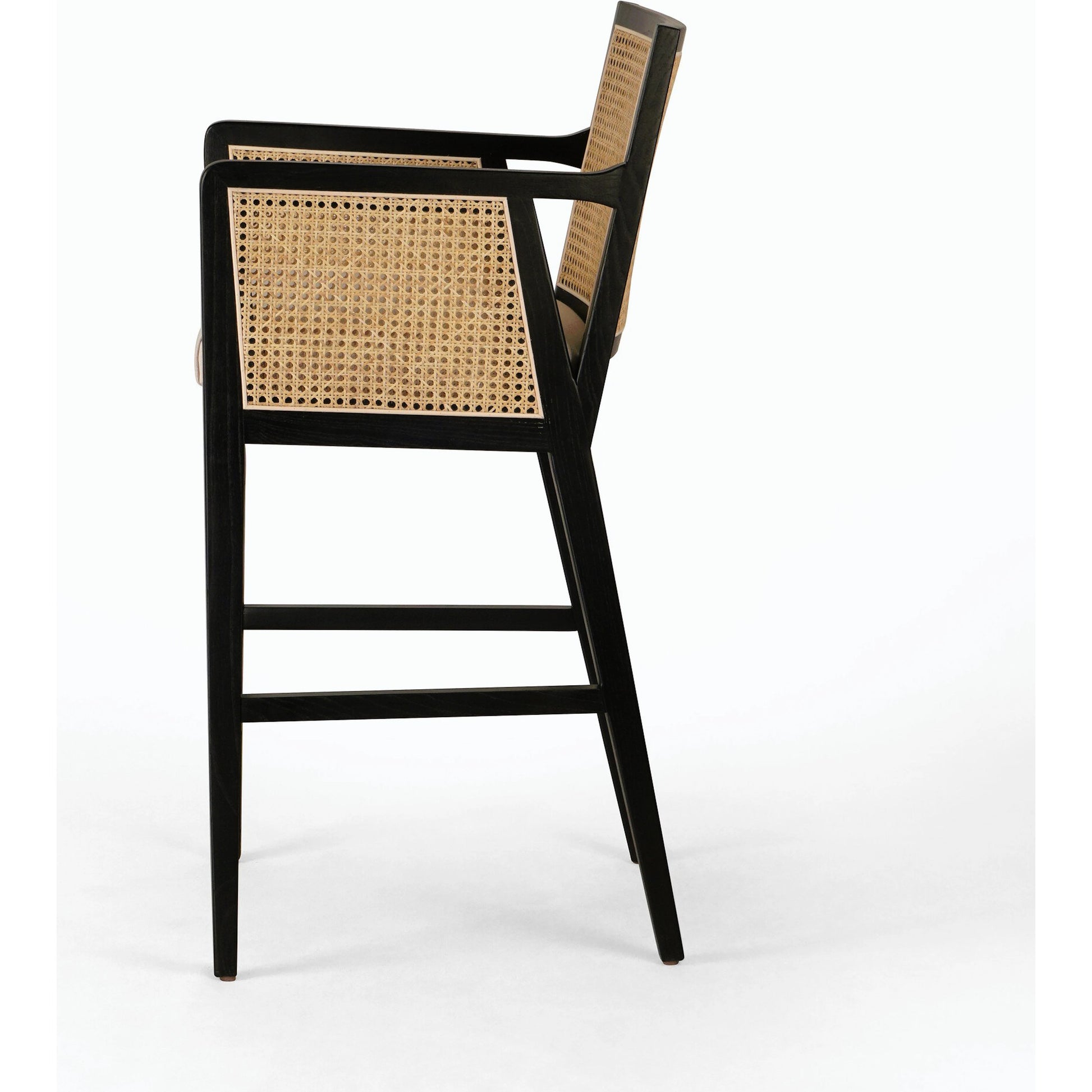 Antonia Bar Stool by Four Hands in light natural cane, brushed ebony, brass kickplate, savile flax. Made from 92% polyester, 8% flax, linen, solid nettlewood, iron in a modern style.