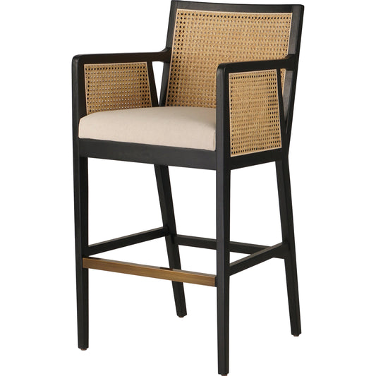 Antonia Bar Stool by Four Hands in light natural cane, brushed ebony, brass kickplate, savile flax. Made from 92% polyester, 8% flax, linen, solid nettlewood, iron in a modern style.