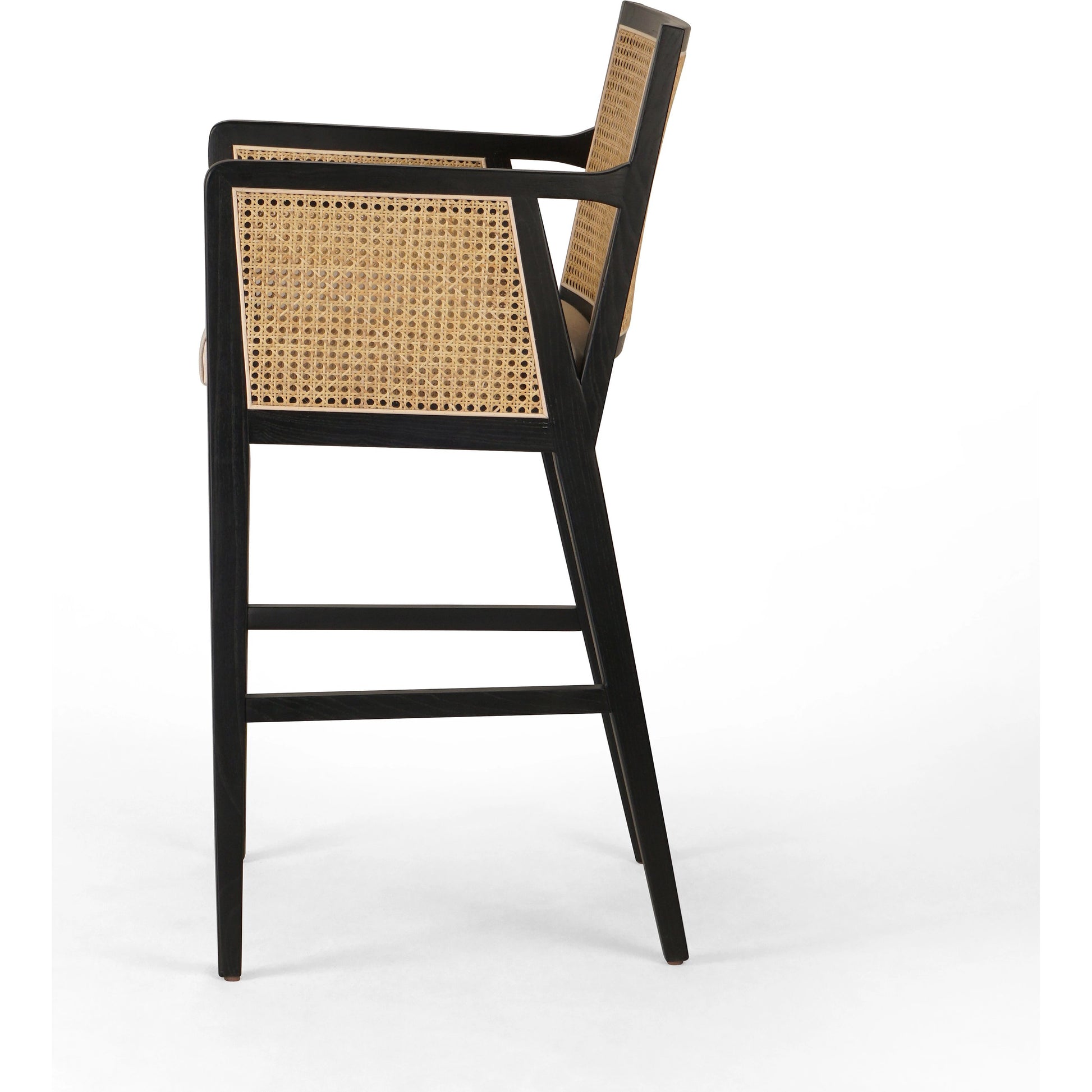 Antonia Bar Stool by Four Hands in light natural cane, brushed ebony, brass kickplate, savile flax. Made from 92% polyester, 8% flax, linen, solid nettlewood, iron in a modern style.