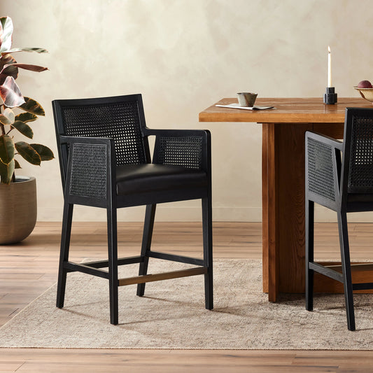 Antonia Cane Counter Stool by Four Hands in sonoma black, brushed ebony. Made from top grain leather, solid nettlewood, iron in a modern style.