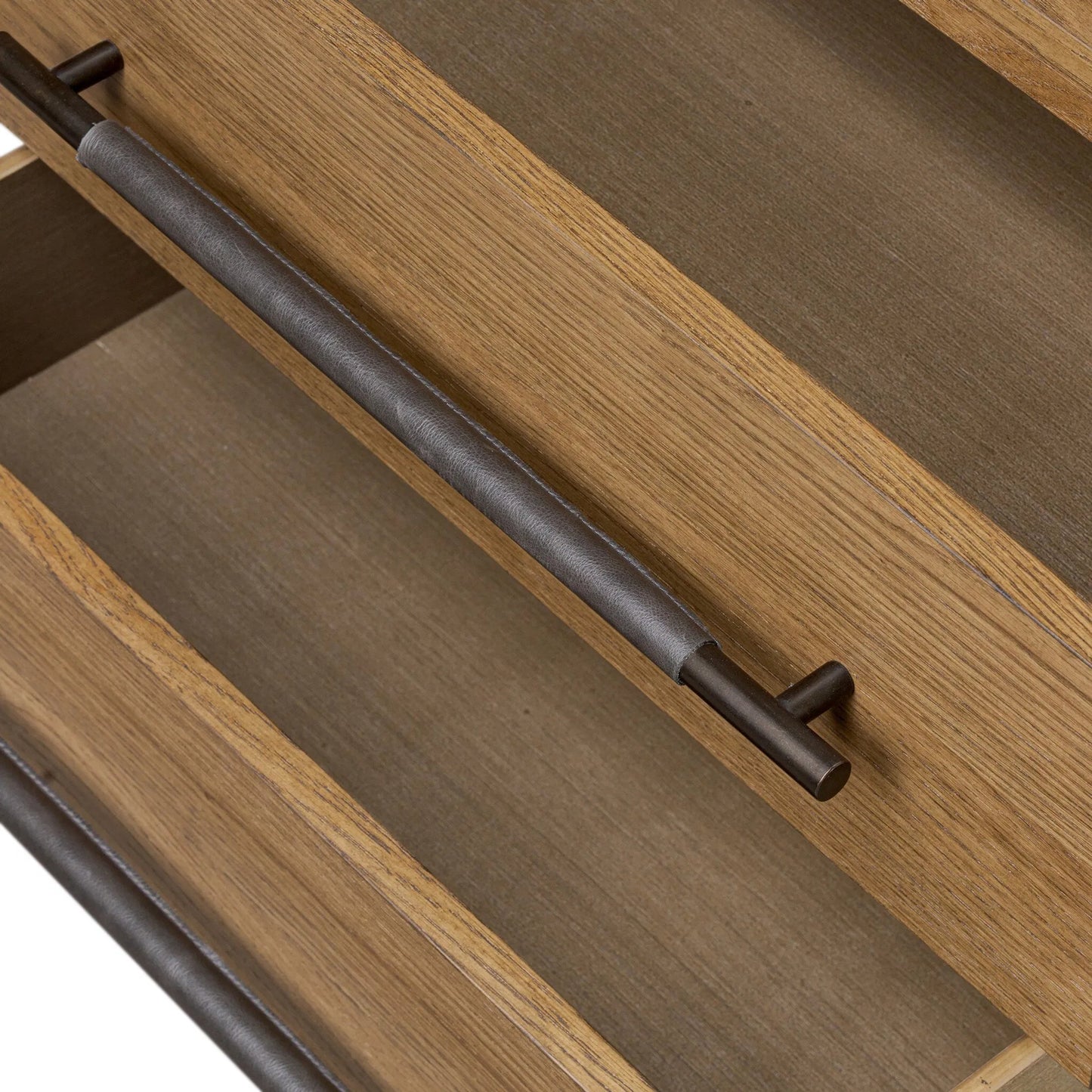 011 SI-2519286 | Closeup | Rosedale Nightstand by Four Hands in amber oak veneer, chaps ebony. Made from oak veneer, top grain leather in a unique style.