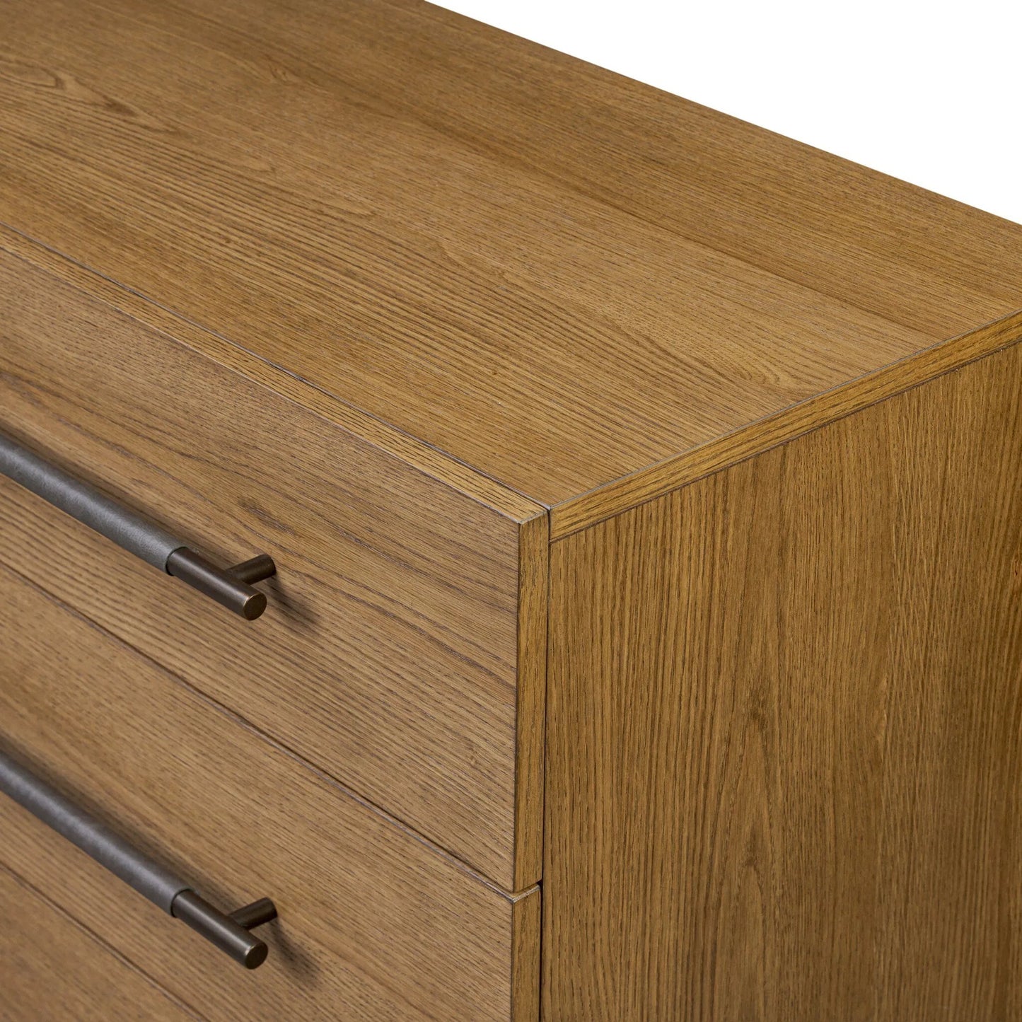 008 SI-2519283 | Closeup | Rosedale 6 Drawer Dresser by Four Hands in amber oak veneer, chaps ebony. Made from oak veneer, top grain leather in a unique style.