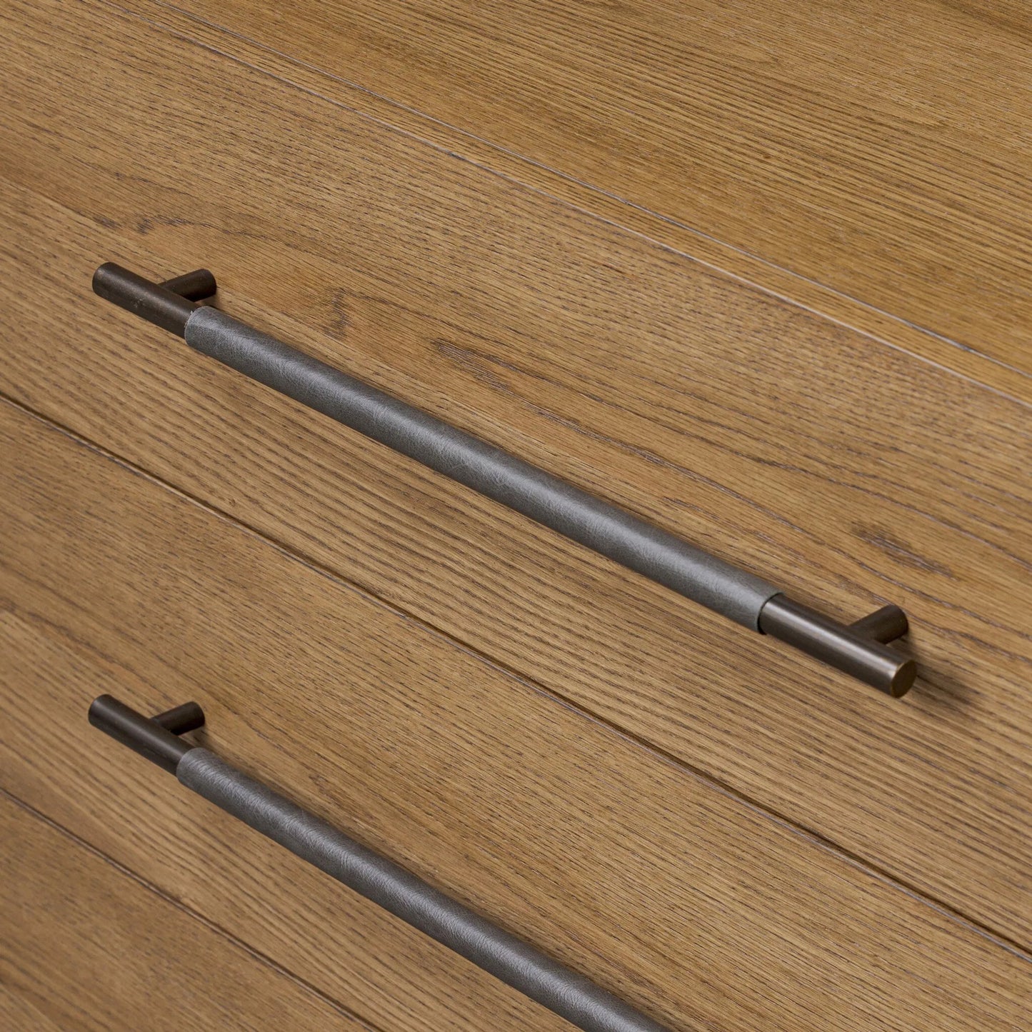 010 SI-2519283 | Closeup | Rosedale 6 Drawer Dresser by Four Hands in amber oak veneer, chaps ebony. Made from oak veneer, top grain leather in a unique style.