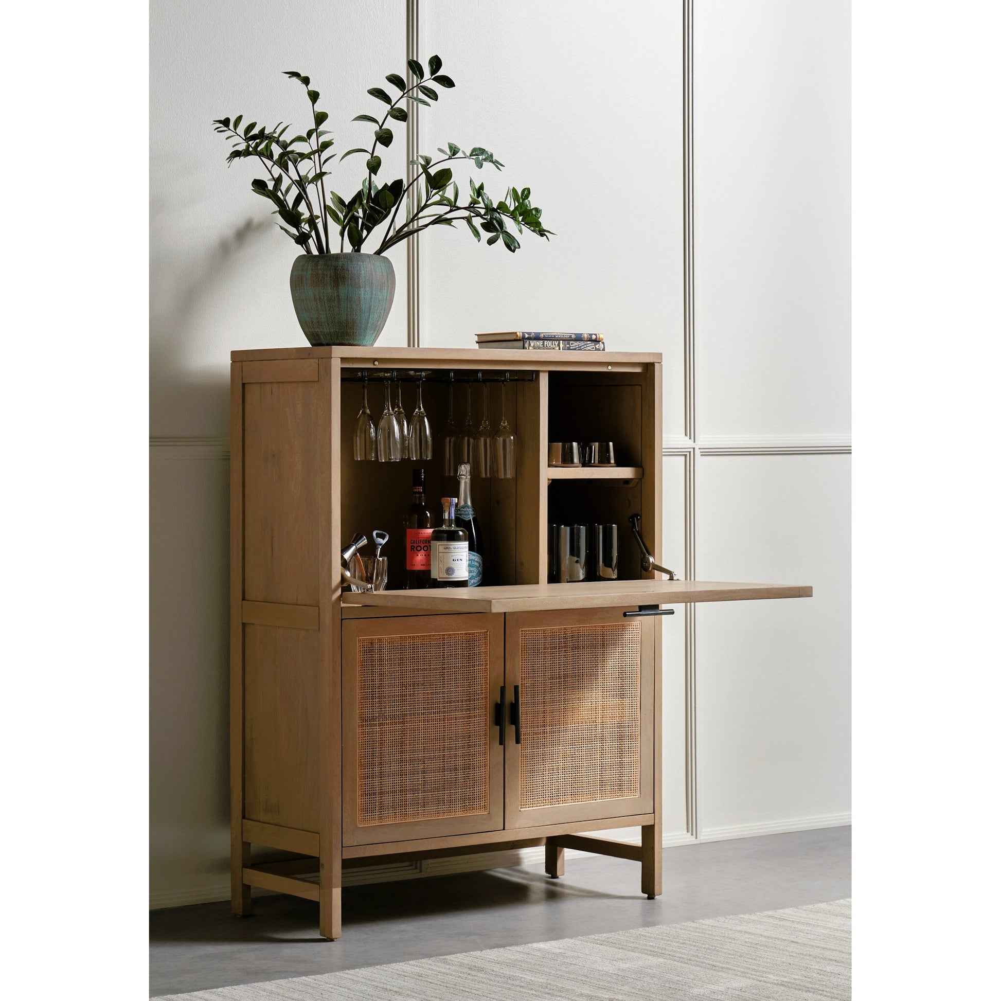 Caprice Bar Cabinet by Four Hands in natural mango, natural cane. Made from solid mango, cane in a coastal style.
