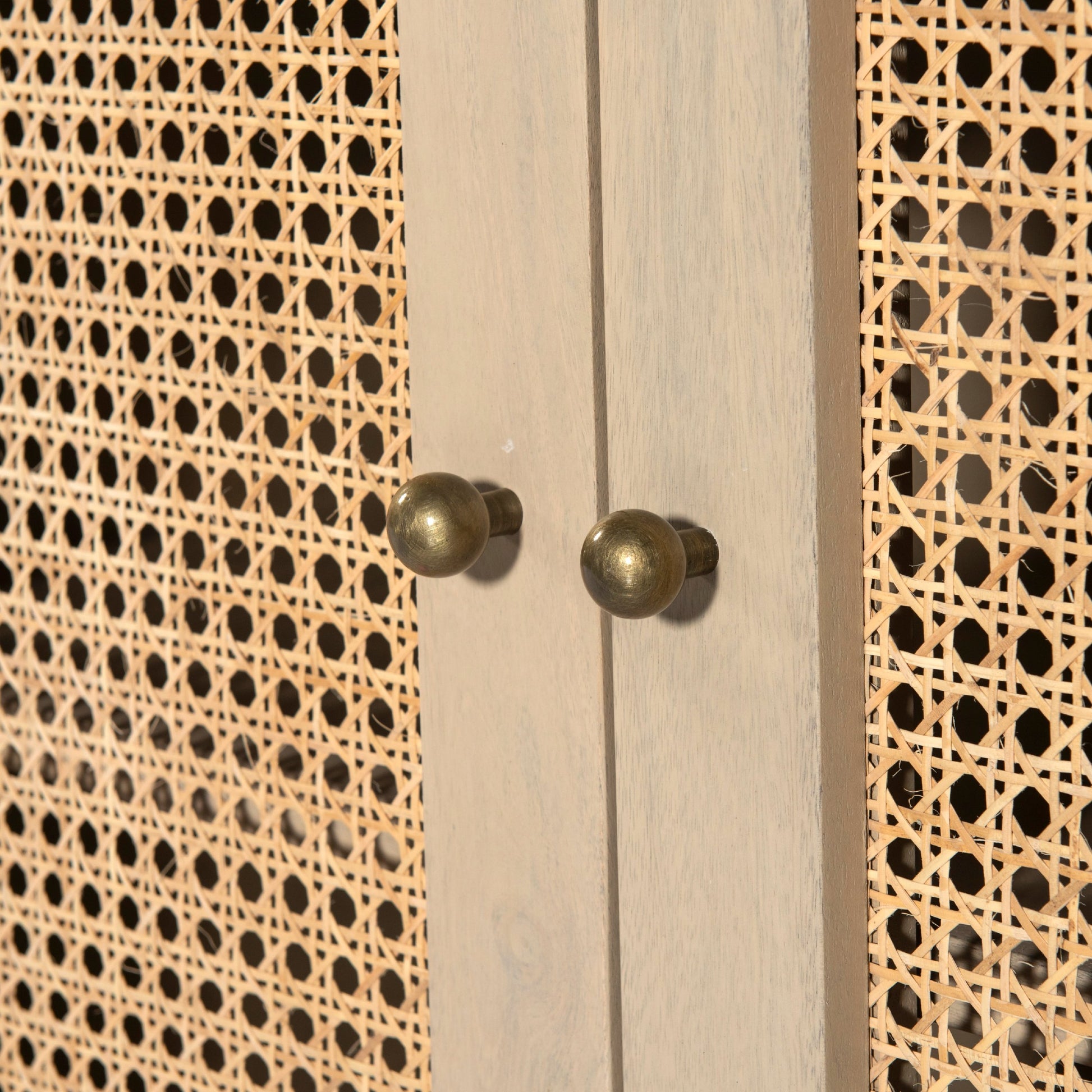 Tilda Sideboard by Four Hands. Made from solid mango, cane in a transitional style.